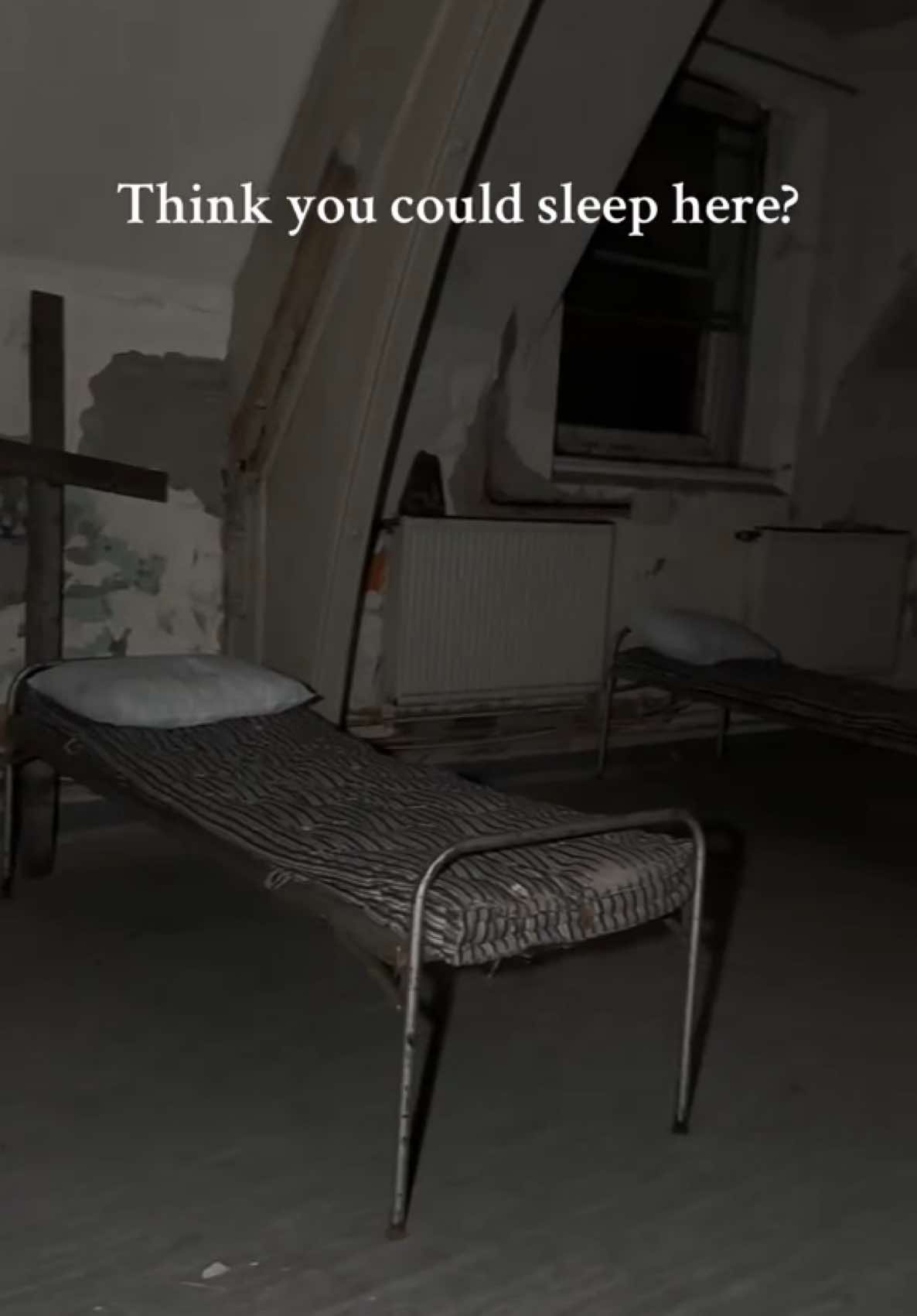 Would you sleep in one of these beds? #abandoned #haunted #abandonedhospital #abandonedasylum #scary #spooky #horrortok #urbex #hauntedtiktok