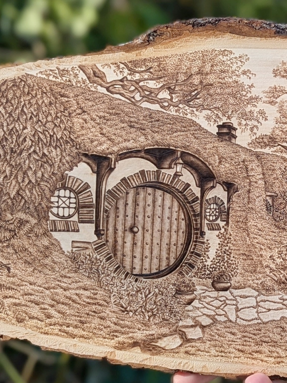 What 80 hours of woodburning Bag End from the Lord of the Rings looks like!  #lordoftherings #lotr #art #woodburning #pyrography #cottagecore 