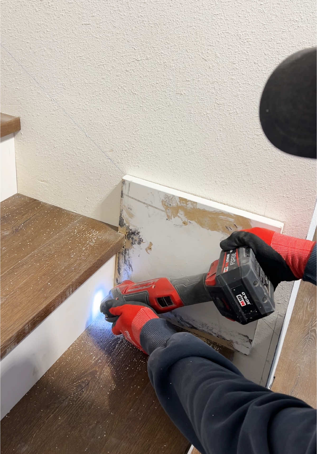 Part 2 of cutting back flooring on stairs for skirting with results at the end #tools #construction #remodel #satisfying #fyp #trending #viral #bluecollar #wood #DIY #asmr #repair #lvp #lvt #laminate #vinylflooring #laminateflooring #flooringinstallation #vinyl #stairs 