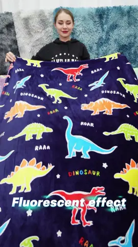 Dinosaur blanket glowing in the dark #blanket #glow #fyp 
