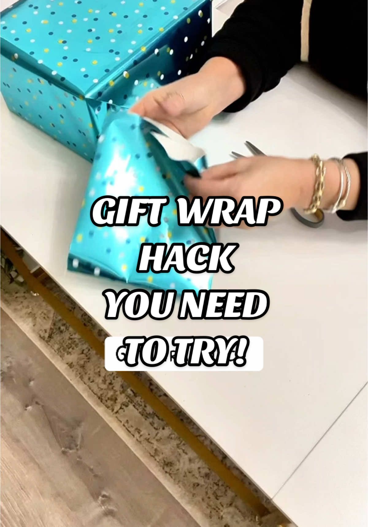 SAVE THIS and all your scraps of gift wrap. You'll love making these bows and reducing waste too! Here's the steps to try it⬇️ • fold paper in half. (If it's foil paper like this, it's easier to cut it the foil side is on the inside.) • cut small strips from the bottom up about 1/2