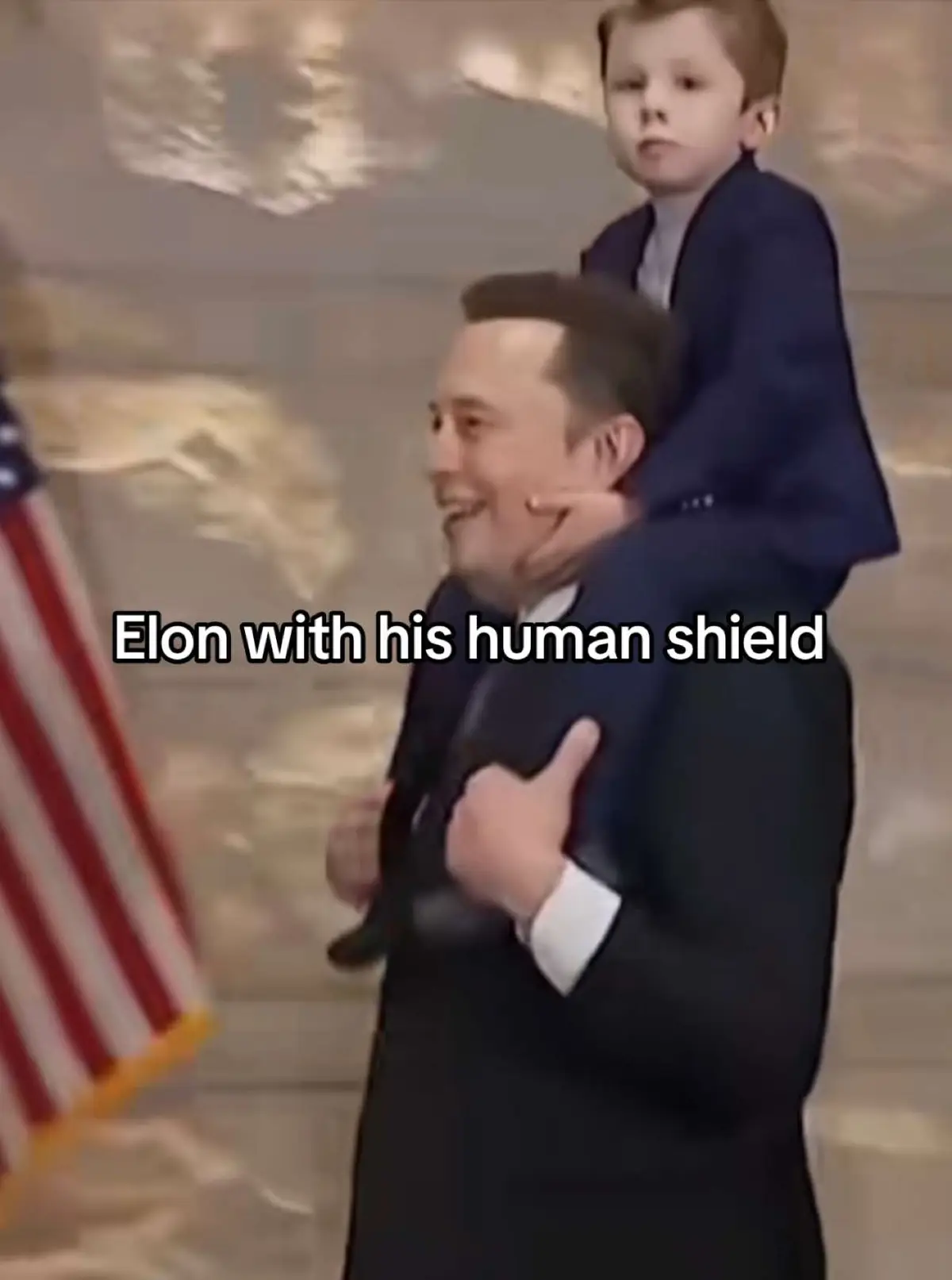 Elon using his son (who looks extremely uncomfortable and he doesnt see) as a human shield because ceo’s are getting pew pewd 🤨 #fyp #elonmusk #titanic #ceo #unitedhealthcare 