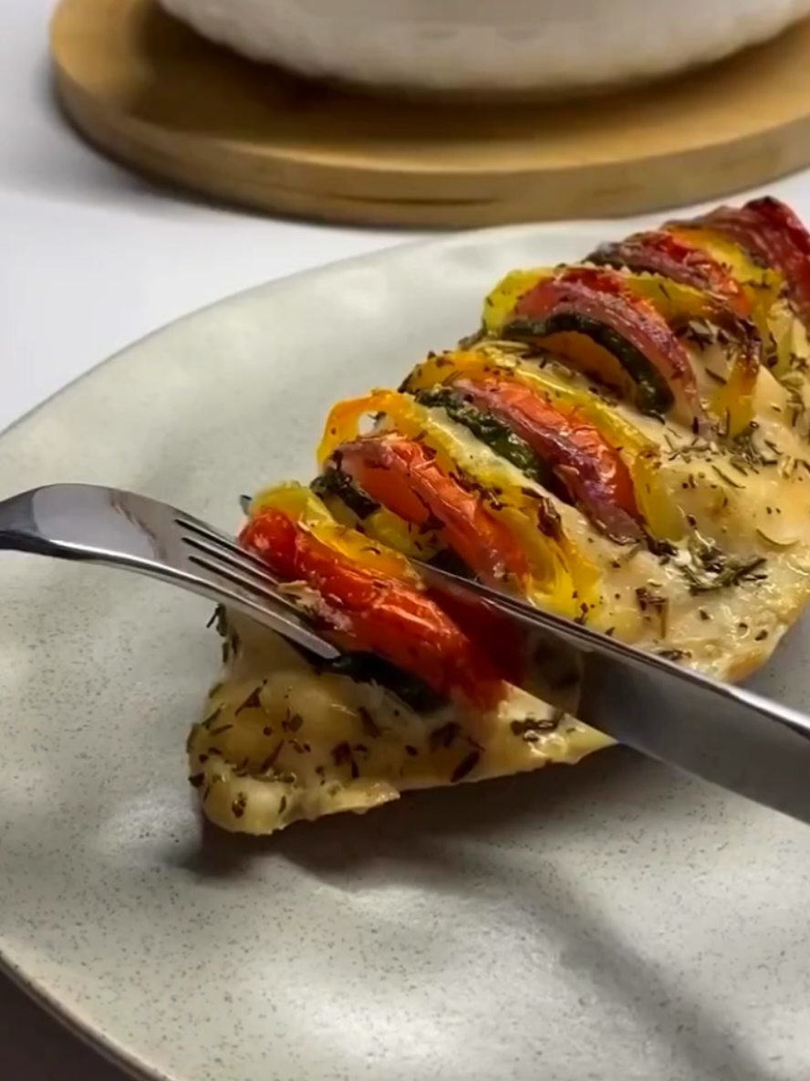 Juicy Chicken with Seasonal Vegetables 🍗🌿 An easy and delicious recipe perfect for lunch or dinner – every bite is full of flavor and juiciness! --- Ingredients: For the chicken and vegetables: 🐓 Chicken fillet 🥒 Zucchini (trim only unsightly parts; no need to peel) 🍅 Ripe red tomato 🧅 Red onion 🌶️ Bell pepper (bright yellow or orange preferred) For the marinade (for 2 chicken fillets): 🫒 Olive oil – 2 tbsp 🌿 Provençal herbs – 1/2 tsp 🧂 Salt – 1 tsp (level) 🖤 Black pepper – 1/3 tsp --- Instructions: 1. Prep the Vegetables: Slice the zucchini, tomato, onion, and bell pepper into half rings. This ensures the vegetables will be fully integrated into the dish, adding maximum juiciness. 2. Marinate the Chicken: In a bowl, mix olive oil, Provençal herbs, salt, and black pepper. Coat the chicken fillets with the marinade and let them rest for 10-15 minutes. 3. Assemble: Arrange the chicken fillets and sliced vegetables in a baking dish. 4. Bake: Preheat your oven to 180°C (356°F). Bake the dish for 40-50 minutes or until the chicken is fully cooked and juicy. 5. Serve: Perfect for a wholesome lunch or dinner. Enjoy the vibrant flavors! --- ✨ Simple, healthy, and irresistibly juicy – try it today! #simpleeats__, #ChickenRecipe, #SeasonalVegetables, #HealthyMeals, #MediterraneanInspired, #FoodLover, #BakedChicken, #DinnerIdeas, #LunchRecipes, #HealthyLiving, #EasyCooking, #EatWell