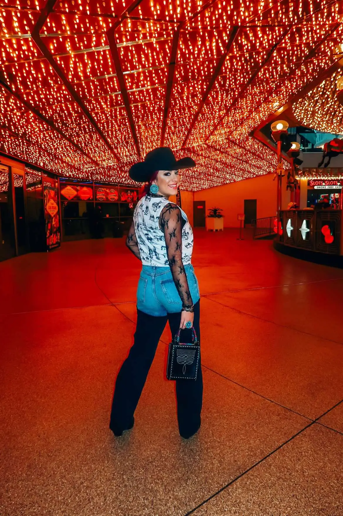 @lasvegasnfr day 3 outfit — LIVIN it up ♠️❤️  Hat: @americanhatco  Vest: @thegoodbabesco  Jeans: @pirall  Boots: @danpostbootco and discount code TRENDSETTER15 Purse: @alamosaddles  Jewels: @chacocanyontrading  #nfrfashion #nfrstyle #nfr #nationalfinalsrodeo #cowgirloutfit #rodeofashion #westernlifeandstyle #cirodeorunway #legendaryvegasrodeo #cowboysandindiansmagazine #vegas #lasvegas #westernfashion #westernstyle #westernlifestyle #vintagewesternwear #vintagewestern #cowboys #danpost #cowboyboots #americanhatco #americanhat #texasgirl #cowgirlhat #cowgirlboots