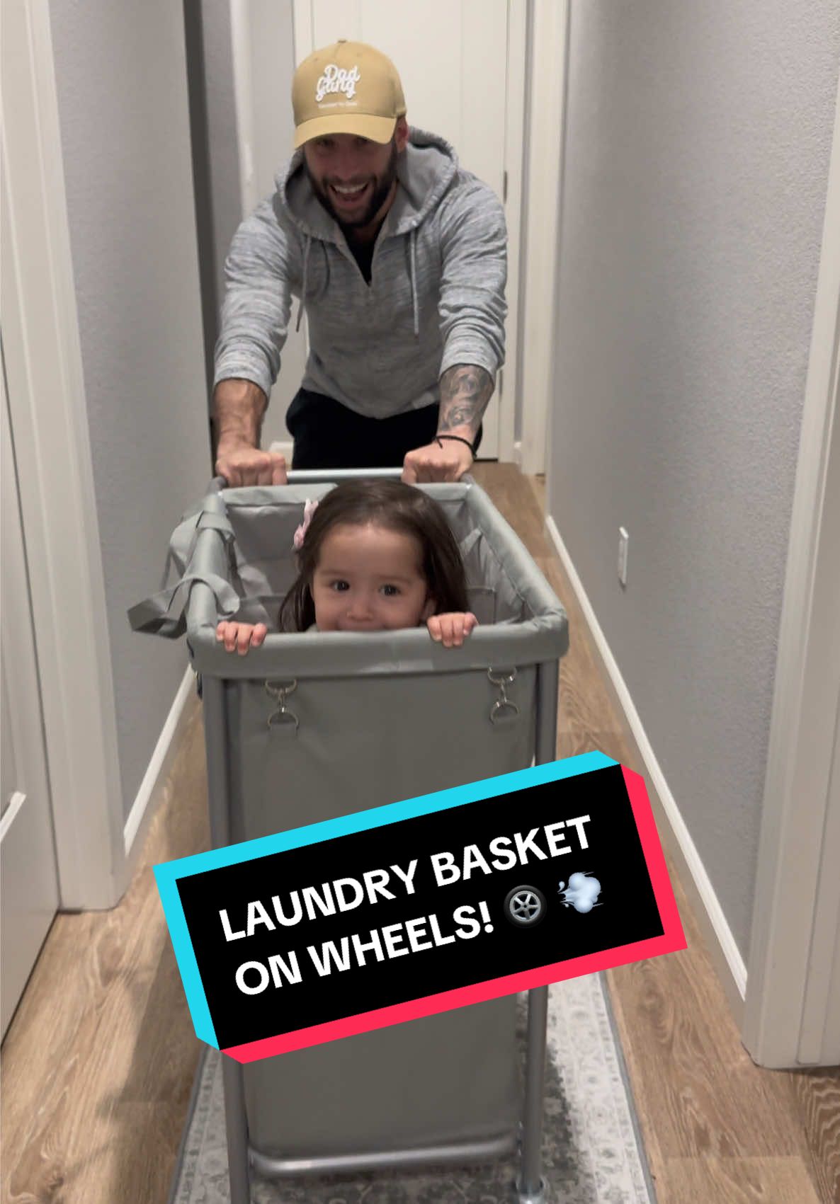 This laundry basket on wheels turns chores into fun! #laundrytok #laundrybasket  #dadsoftiktok #dads #MomsofTikTok #moms #parents #deals #chores #fundad 