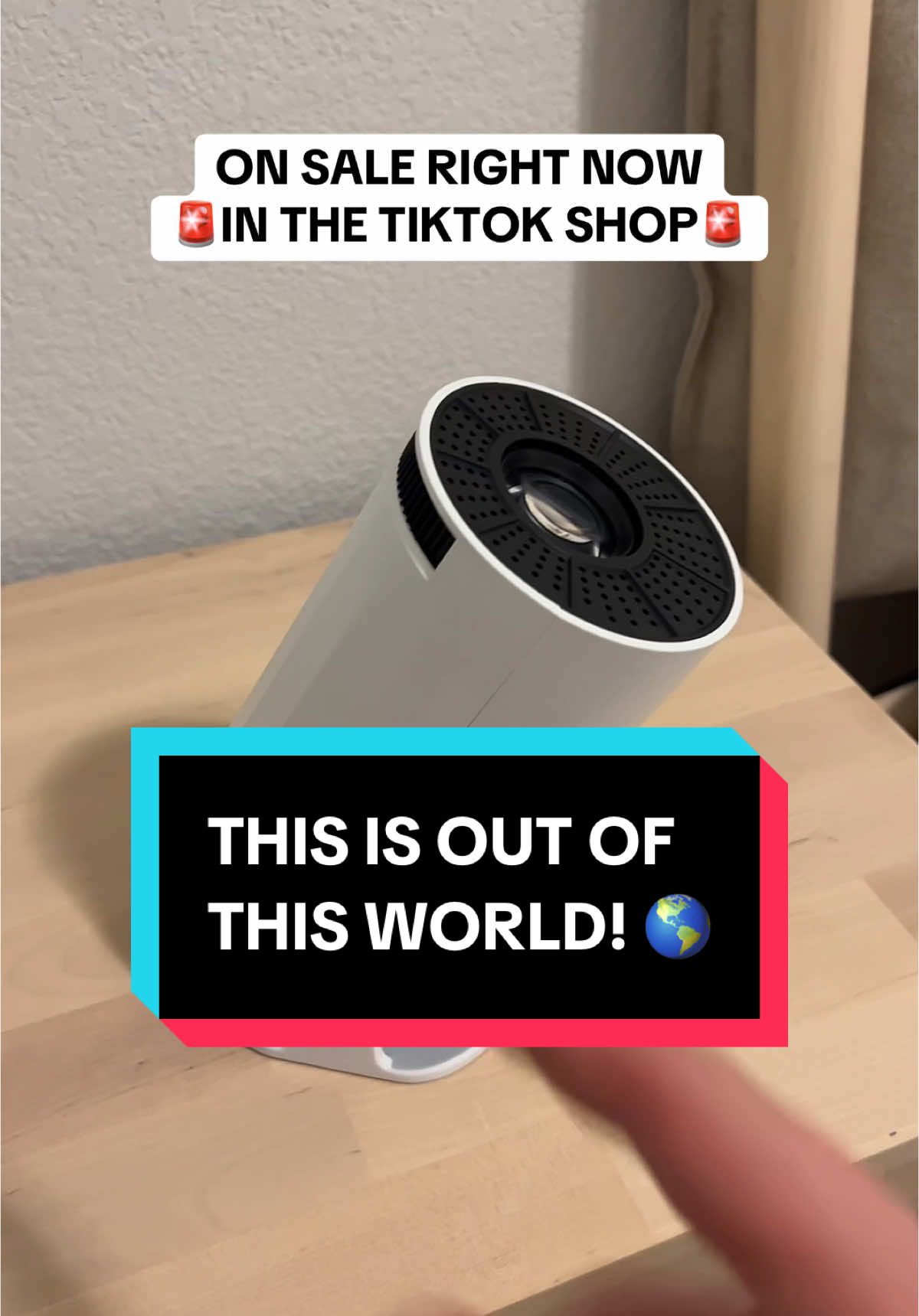 This is out of this world! 🤯🚨 #miniprojector #4kprojector #holidayhaul #bestchristmasgift #stockingstuffers 