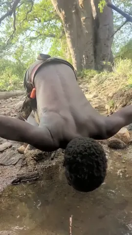 Hadzabe Tribe bushmen get their water directly from nature as they have no modern influence in their lifestyle