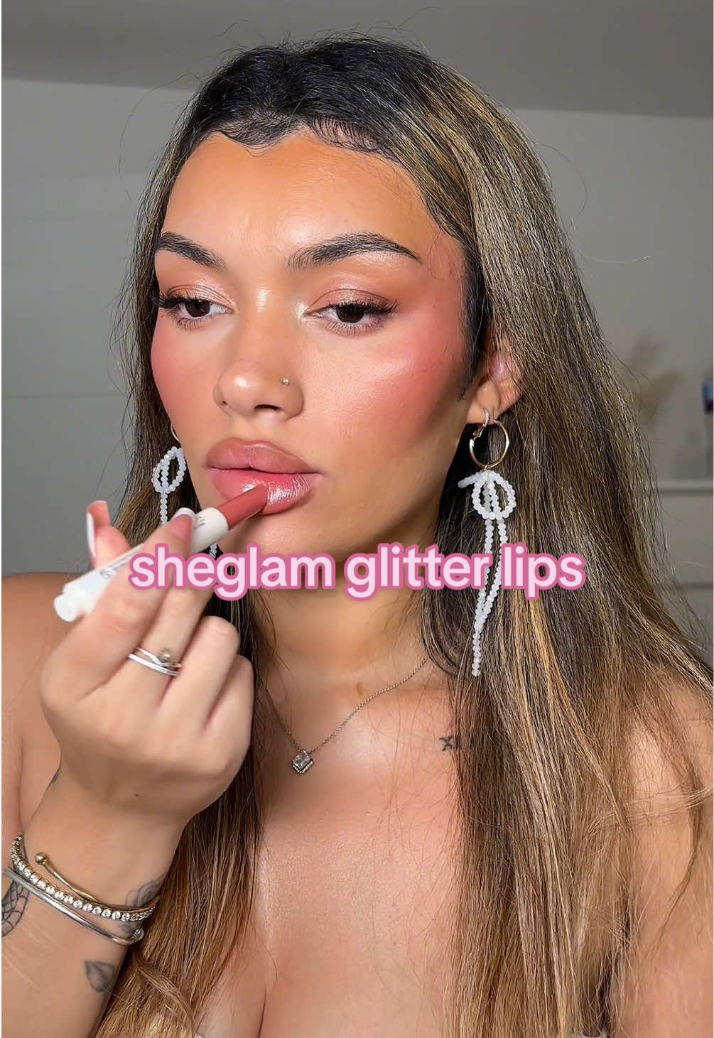 you know how obsessed i am glitter lips and this shimmery lip plumper from @SHEGLAM is everything and more ✨  the shade is pink flamingo 💕  #sheglamlipplumper #shimmerlipgloss #glitterlips #glitterlipgloss #glossylips #lipswatch #lipswatches #makeup #makeupswatches #liptutorial #affordablemakeup #lipglossswatch #pinklipgloss 