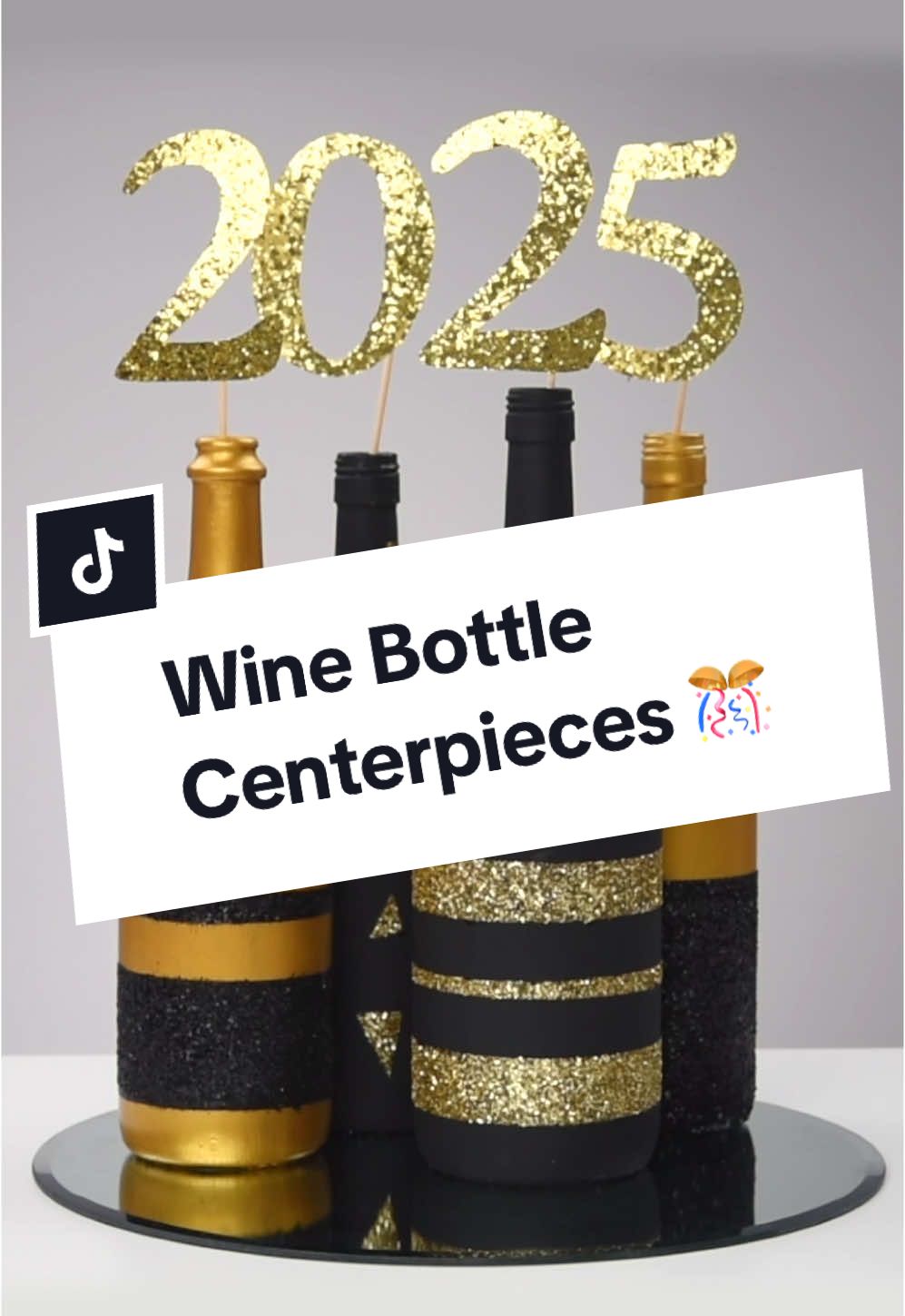 Countdown in style with these DIY wine bottle centerpieces! 🥂✨ Black, gold, and glittery—they’ll have your table looking as fabulous as 2025 will be (fingers crossed)! 🎉🍾 #newyearseve #diycraftideas #winebottle #centerpieces #diypartydecor #craftidea 