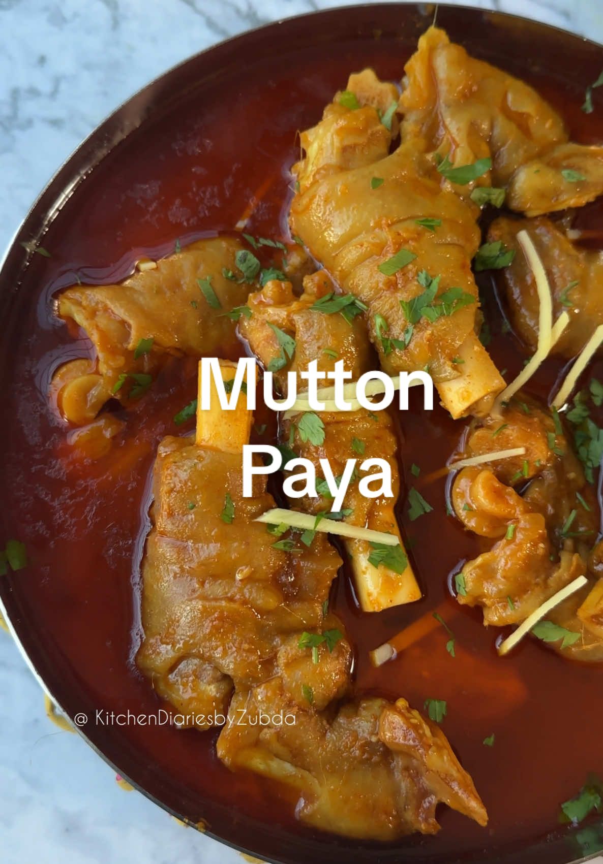 Mutton Paya Curry!  Warm Your Soul with Mutton Paya Curry,  a traditional dish that celebrates the culinary heritage of South Asia. Made with tender mutton trotters, this slow-cooked curry is infused with aromatic spices, ginger-garlic goodness, and a touch of creamy yogurt, resulting in a dish that's both comforting and deeply satisfying.  Each bite offers a delightful blend of textures, with the succulent trotters simmered to perfection, allowing the spices to meld beautifully. Garnished with fresh coriander and julienne ginger, this curry is not just a meal; it's an experience to savor. Serve it hot with naan, roti, or rice, and finish with a squeeze of lemon for that extra zing! Perfect for gatherings or a cozy dinner, Mutton Paya Curry is sure to warm the heart and delight the palate.  Full recipe on my website! 