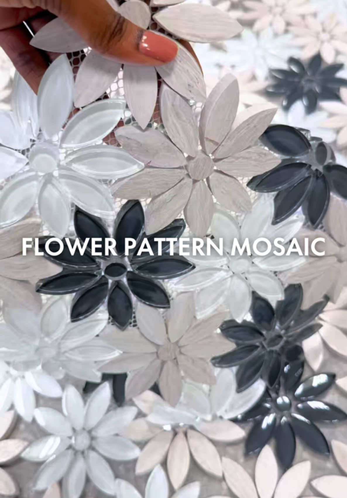 Mosaic tile ASMR. 😍 Your guests will be obsessed with your walls when you use these flower pattern mosaic tiles. 😍🌸🌼 We have these in 3 varieties - black, blue and white.  Grab yours now! 😍 — We have many more mosaic tiles for you to see! Visit our showroom at 5 Red Hills Road, Kingston. #GetTilesGetCreative #mosaic #mosaicmonday #mosaicinspiration #mosaictile #tilelove #tiletrends #tilelovers #flowers #jamaicatiktok 