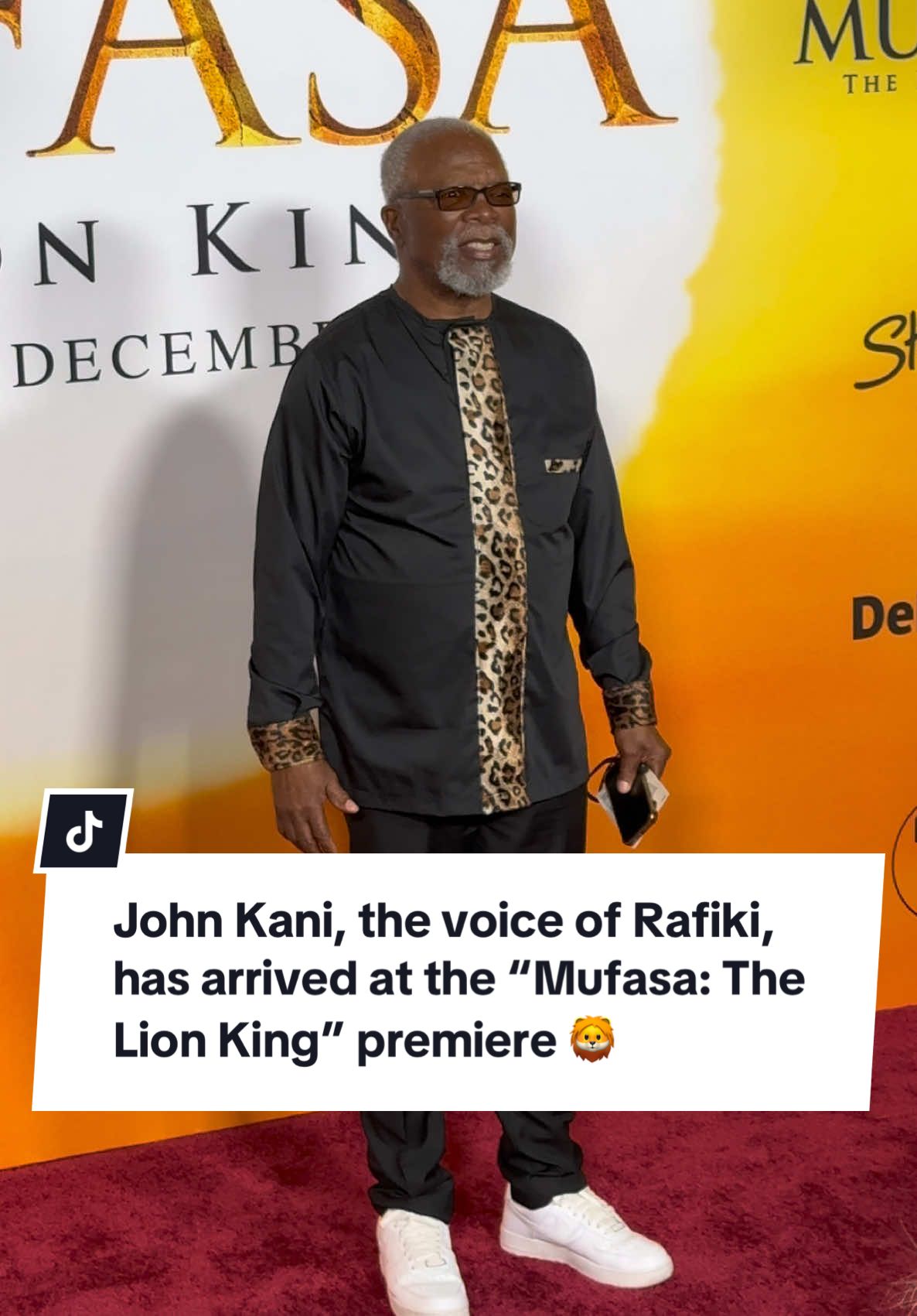 John Kani, the voice of Rafiki, poses on the red carpet at the “Mufasa: The Lion King” premiere #johnkani #rafiki #mufasa #thelionking #disney 