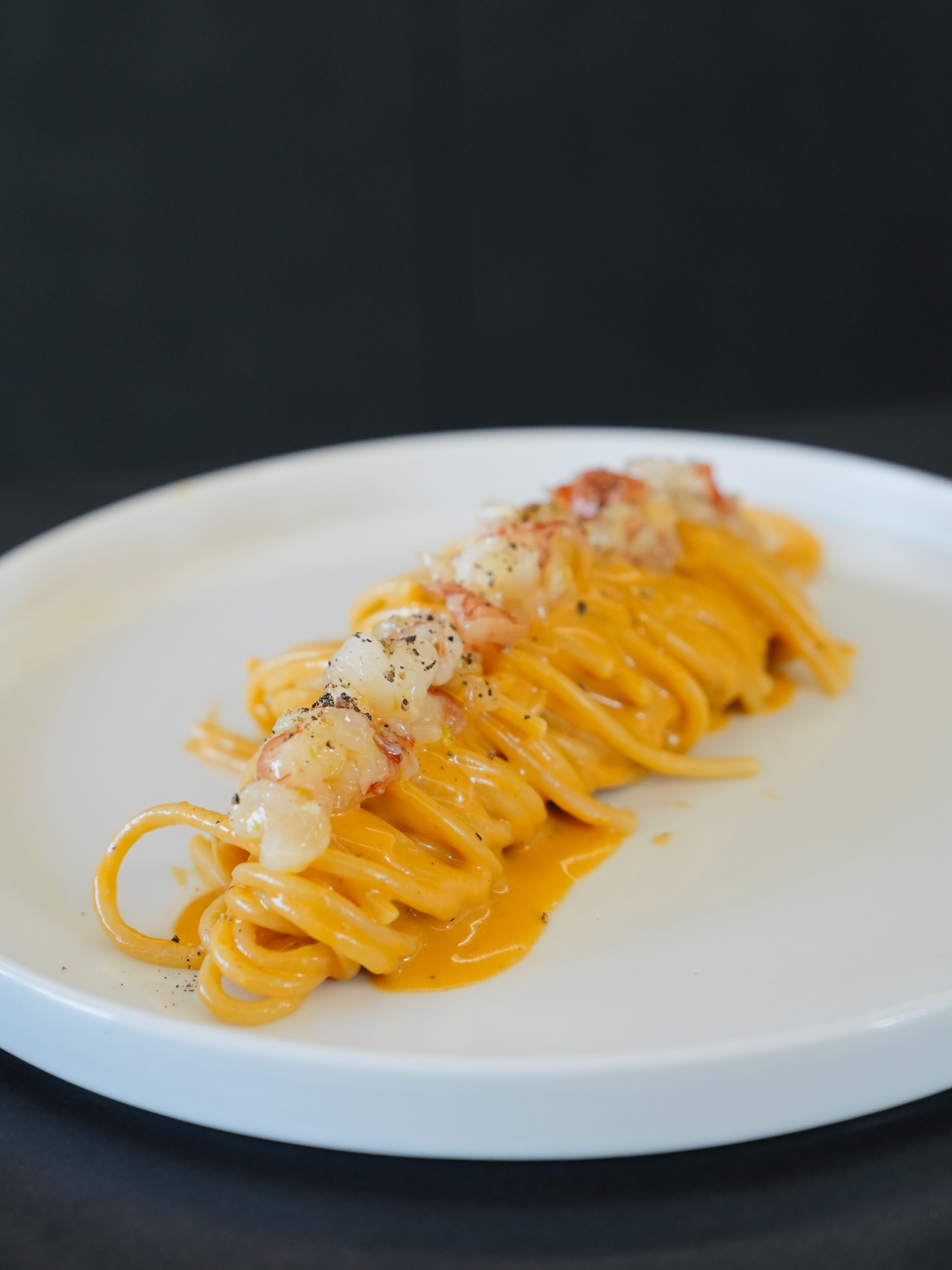 ✨ Elevate your pasta game! Try this gourmet Spaghetti Cacio e Pepe with Raw Shrimp & Bisque 🍤🧀 Perfect for 24th of December!🔥 #spaghetti #pasta #shrimp Ingredients For the raw shrimp: 7 oz fresh shrimp (200 g) Extra virgin olive oil, to taste Salt, to taste Grated lime zest For the bisque: Shrimp heads and shells 1 onion, julienned 1 garlic clove 2 ripe tomatoes Cold water and ice, as needed For the cacio e pepe sauce: 7 oz Pecorino Romano cheese (200 g) 1 tbsp whole black peppercorns Pasta cooking water, as needed For the pasta: 7 oz spaghetti (200 g) Salt, to taste