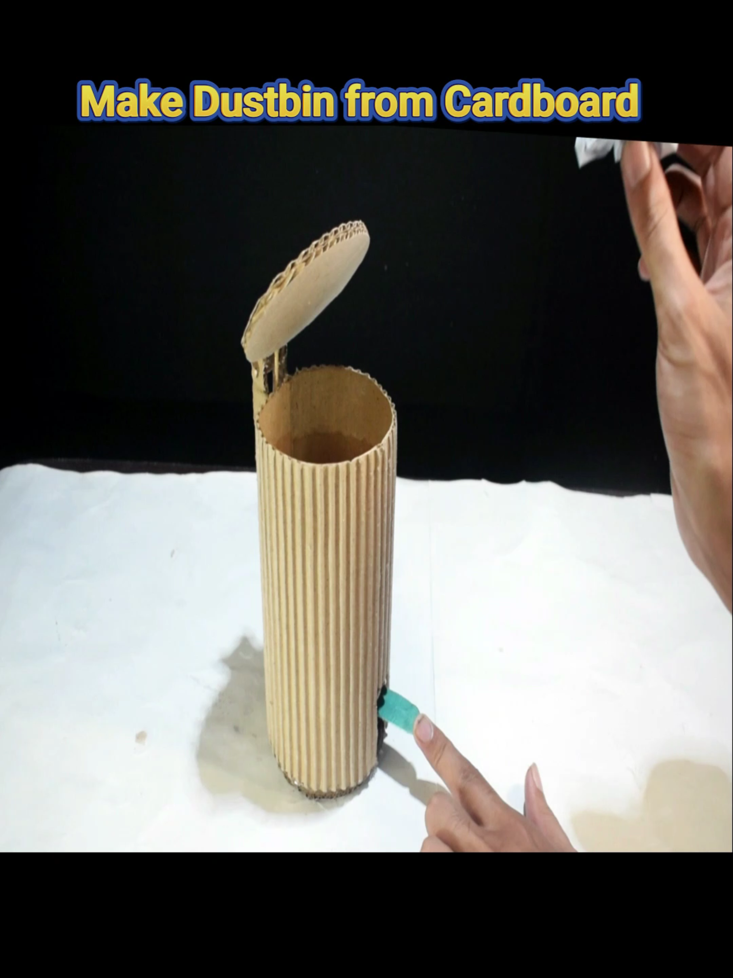 A creative and eco-friendly project! Here's a step-by-step guide to make a dustbin from cardboard for your school project: *Materials Needed* - Cardboard sheets (large and small) - Scissors - Glue or hot glue gun - Ruler or straightedge - Pencils or markers - Tape - Decorative materials (optional) *Step-by-Step Instructions* 1. *Cut out the base*: Cut a large cardboard sheet to create the base of the dustbin (approx. 12