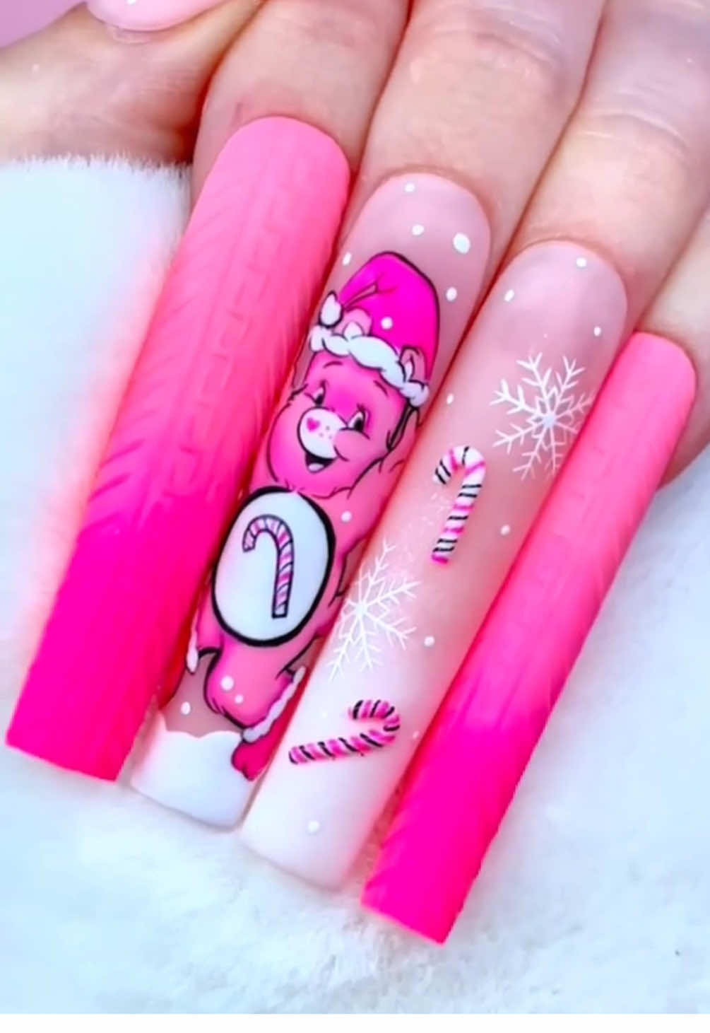 ❤️ candy cane bear 🤍 is our new fave #carebear for the holidays 🤭🌸 maybe it’s because she’s PINQUE 💞 🎀 @pretty in pinque • adrianna using all #tickledpinquecosmetics to bring this creation to life 🌸 💖 who else should we paint and add to our PINQUEMAS family?! 🤭  #tickledpinque #prettyinpinque #holidaynails #christmasnails #characternails #nailart #nailinspo #nailsoftiktok 