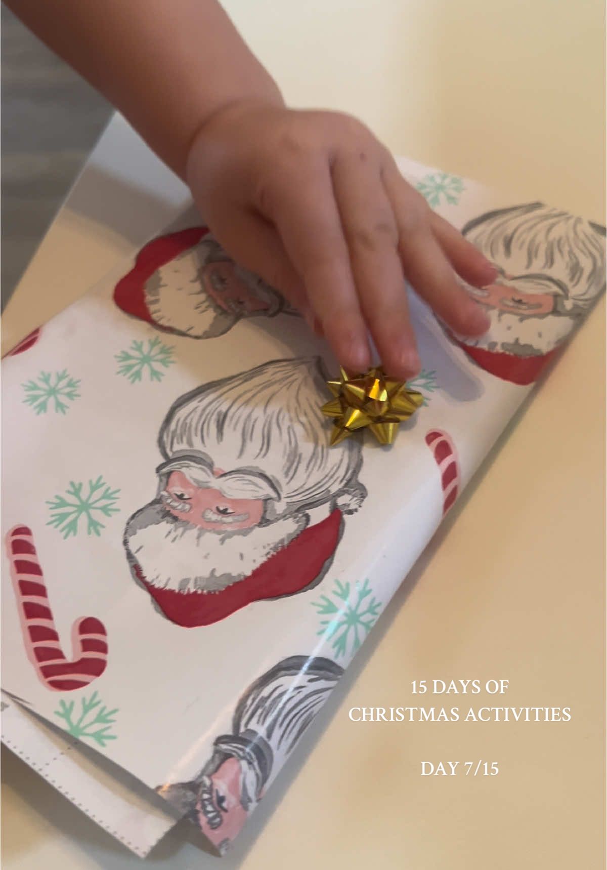 Perfect solution to my toddler always trying to help me wrap gifts! 🎁 #15daysofchristmasactivites #christmasactivities #toddlerchristmas #toddlermama #toddleractivities #giftwrapping 