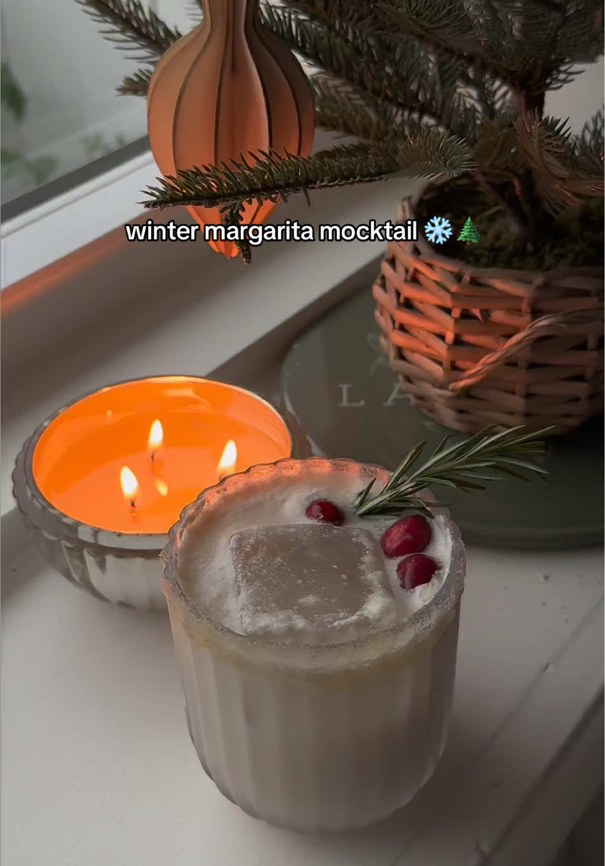 spreading holiday cheers one mocktail at a time! 👇 - rim your glass with maple syrup and sugar - add lime juice, coconut milk, and Holiday Cheers kombucha in a shaker - shake gently and pour over ice in prepped glass - garnish with fresh cranberries and rosemary #mocktail #holidaymargarita #healthade #holiday #drinktok #winterrecipe 