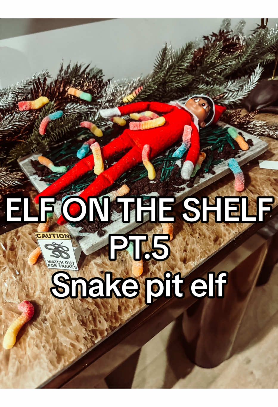 Uh oh, our elf fell into a snake pit.😯🐍 super easy elf on the shelf idea. #elfontheshelf #parentlife #momof5 #MomsofTikTok #elfontheshelfideas #easyelfonashelfideas #christmastraditions #elfitup #elfideas