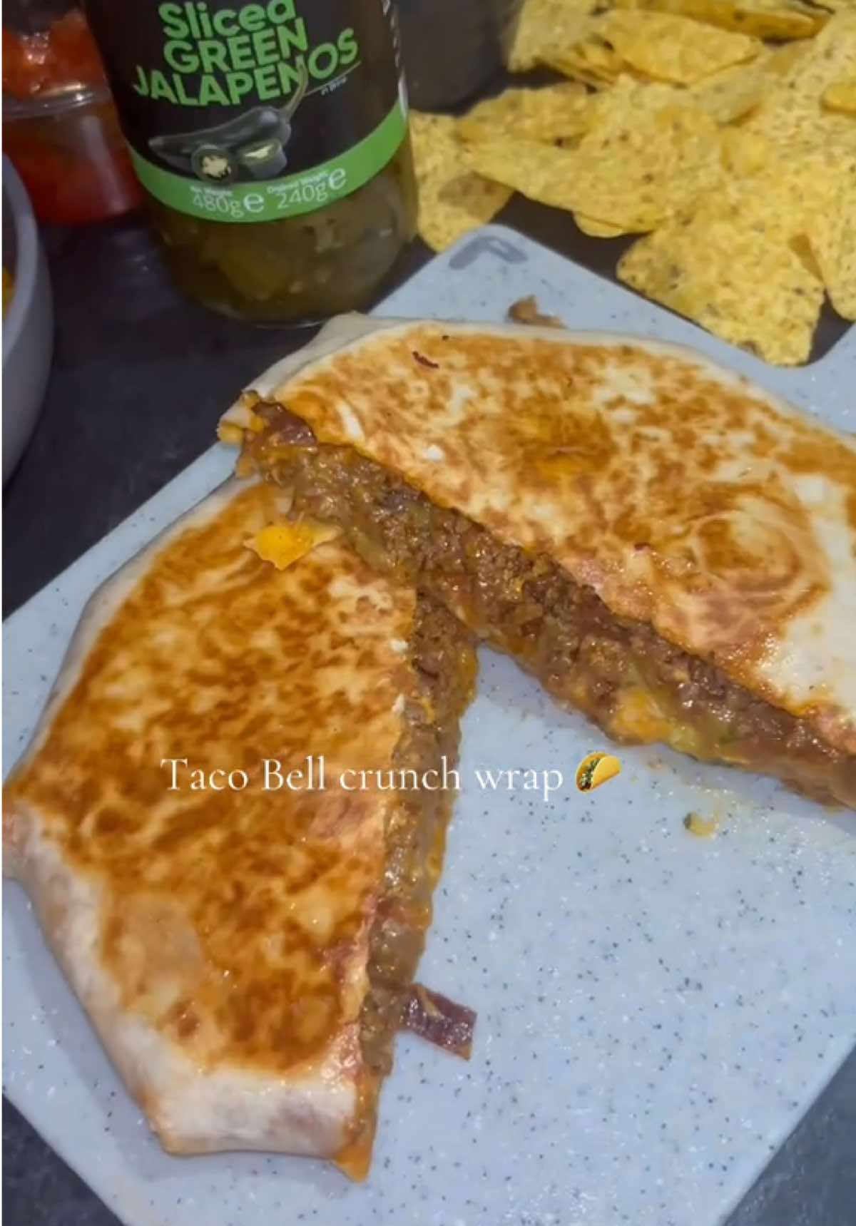 Home made taco bell crunchwrap 🌮 #tacos #tacobell #mexicanfood #crunchwrap #menwhocook #alhamdulillah #tiktokfood #deliciousfood #homecooking #fyp #explorepage✨ #viral_video #recipesoftiktok #halalfood #mexico 