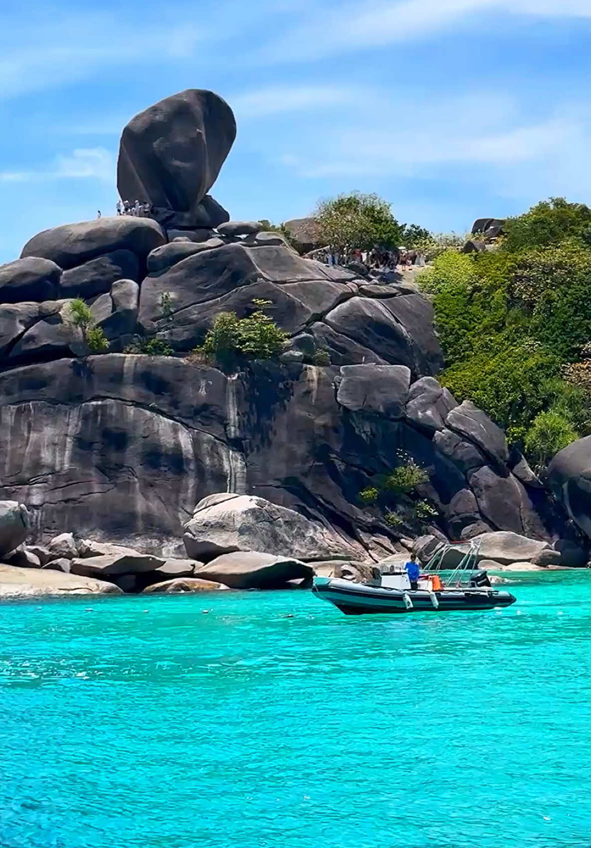 Thailand in blue, a dream come true—come visit and see the hue! 🏝️🪨💦 📍Similan Island - Phang Nga , Thailand 🇹🇭 . . #thailand #thailandtravel #vacation #nature #beach #travel #boatlife #islandlife #visit 