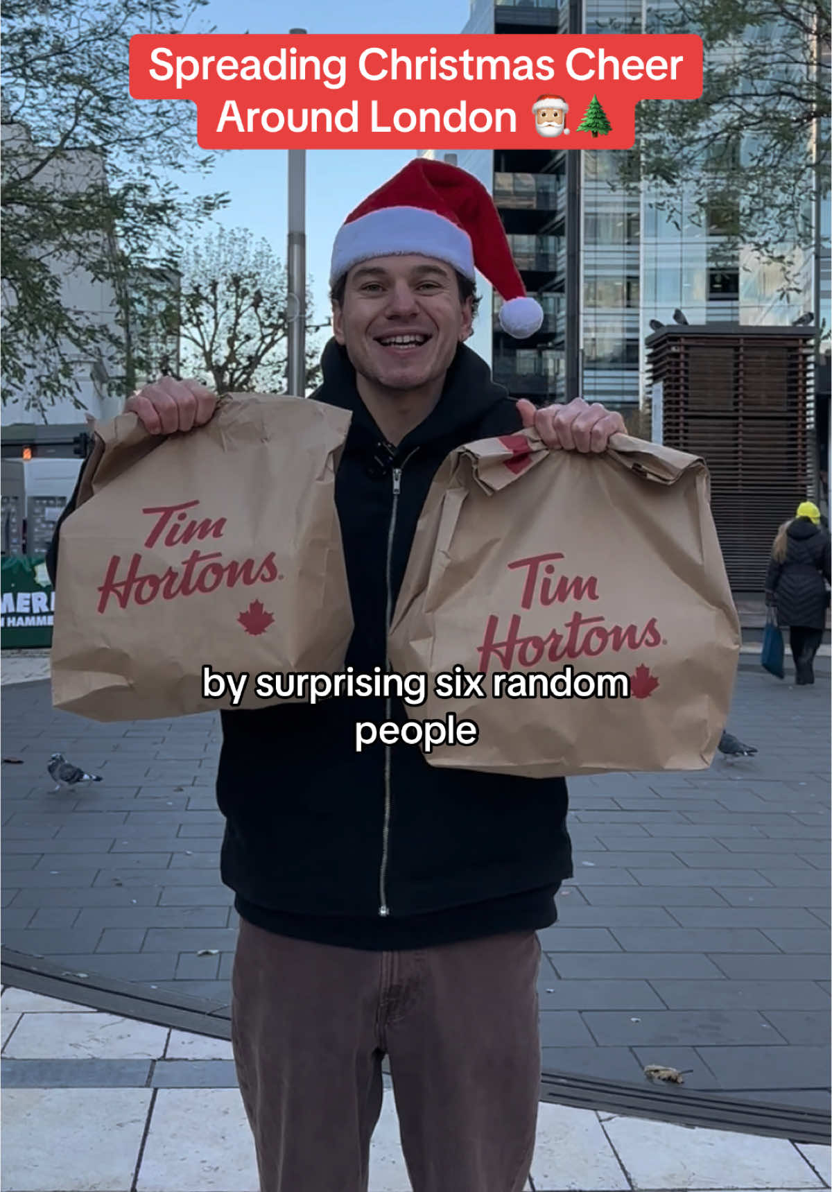 Spreading festive cheer in London with some free donuts! Available for a limited-time! @Timhortonsuk AD #LoveFromTims #TimHortonsUK #HolidayKindness #FestiveRange 
