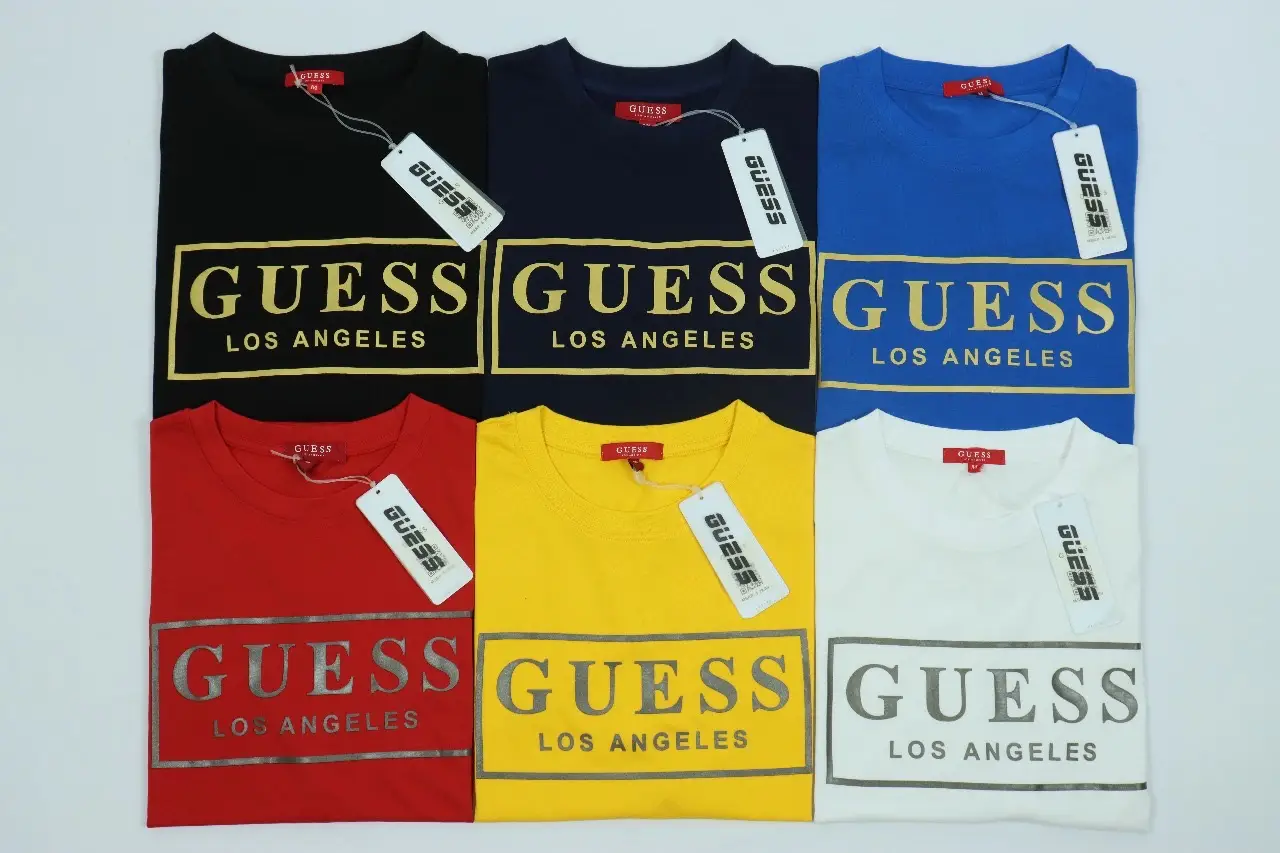 *Premium Quality Short sleeve T- shirt* 👕 *Brand: GUESS*  Fabrics: 100% Cotton S/J 180 GSM  Color: 5/6 As per Pictures  Size:  S  M  L  XL   Ratio: 1  3  3   1 MOQ: 50 Pieces  *Price: $Pcs including shipping for USA 🇺🇲 and Canada 🇨🇦* *Price: £Pcs including shipping for France 🇫🇷, Germany 🇩🇪, Italy 🇮🇹 Spain 🇪🇸* *Price: $Pcs Including shipping for Australia 🇦🇺 and United Kingdom 🇬🇧*  Delivery time: 7-8 Days for America🇺🇸  Delivery time: 15-16 days Europe 🇪🇺 *********Contact for pricing******