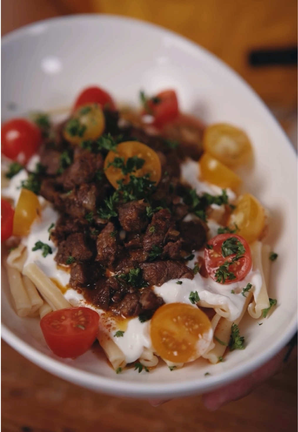 Have you tried the viral Turkish pasta yet? I rarely try food trends but this one is too good not to share! Thank you @Anna Paul for sharing your mom’s recipe with us 🤤 For 2 servings: 5 oz pasta of your choice 1/4 cup cherry tomatoes, halved 1 tbsp chopped parsley Beef: 1/2 lb ground beef (85% lean) 1/4 onion diced 2 garlic cloves minced (optional)  1 tbsp onion powder 2 tsp sweet paprika 1/2 tsp garlic powder (optional) 1/2 tsp salt (or to taste) Pinch of black pepper Yogurt Sauce: 1/2 cup greek yogurt 2 garlic cloves minced Pinch of salt A little lemon juice (optional) Butter sauce: 2 tbsp butter 1/4 tsp sweet paprika #turkishpasta #manti #viral