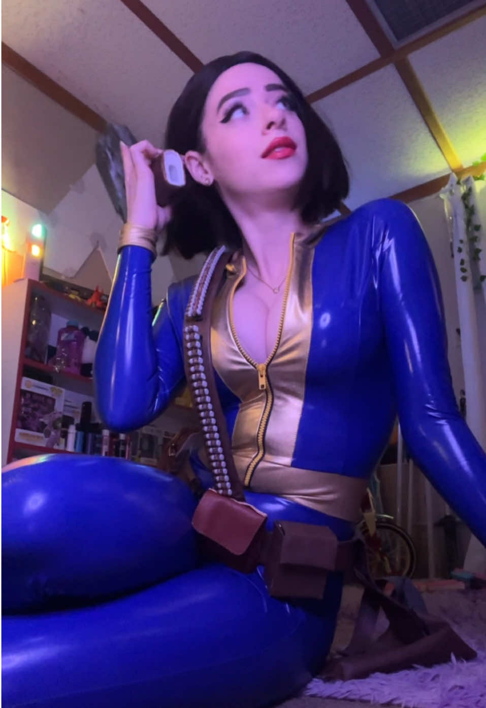 what if i told you vault dweller was coming back? 🤫 🎄 #vaultdweller #falloutcosplay #fallout #vaultsuit #latexlook #latex 