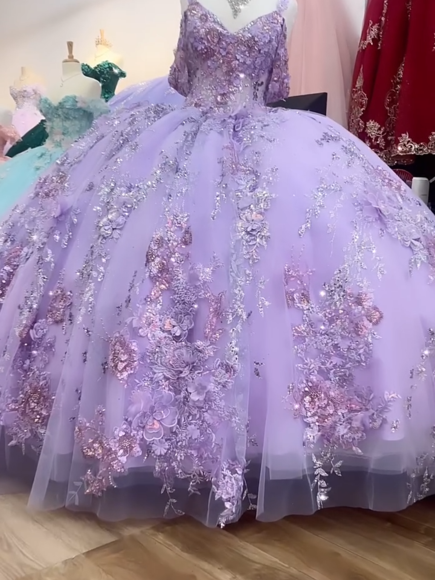 Link in bio❣️  Quinceanera | Lilac 3D Floral Ballgown with Sparkling Rhinestones, Shimmering Sequins, and Detachable Sleeves | Triana dress | 2 Colors Available #quincedress #quincedresses #quinceañera #fuschiaquinceañera #blushquinceañeradress #pinkquincedress #sweetfifteen #sweetfifteens #sweet15 #ballgowns #quinceballoons #floralquinceañera #blackquinceañeradress #navyquinceanera #sagequinceañeradress #bluequinceañeradress #15anos #lilacquincedress #lilacquince #lilacquinceañeradress #goldquincedress #goldquince #goldquinceañera #goldquinceaneradress #hotpinkquincedress #xvaños #xv #quinceanos #misxvaños #quince #vestido #dress #quinceanera2025 #quinceanera2024 #quincedresses2025 #vestidosdequince #quinceusa #champagnequincedresses #usaquinceañeras #missquinceusa