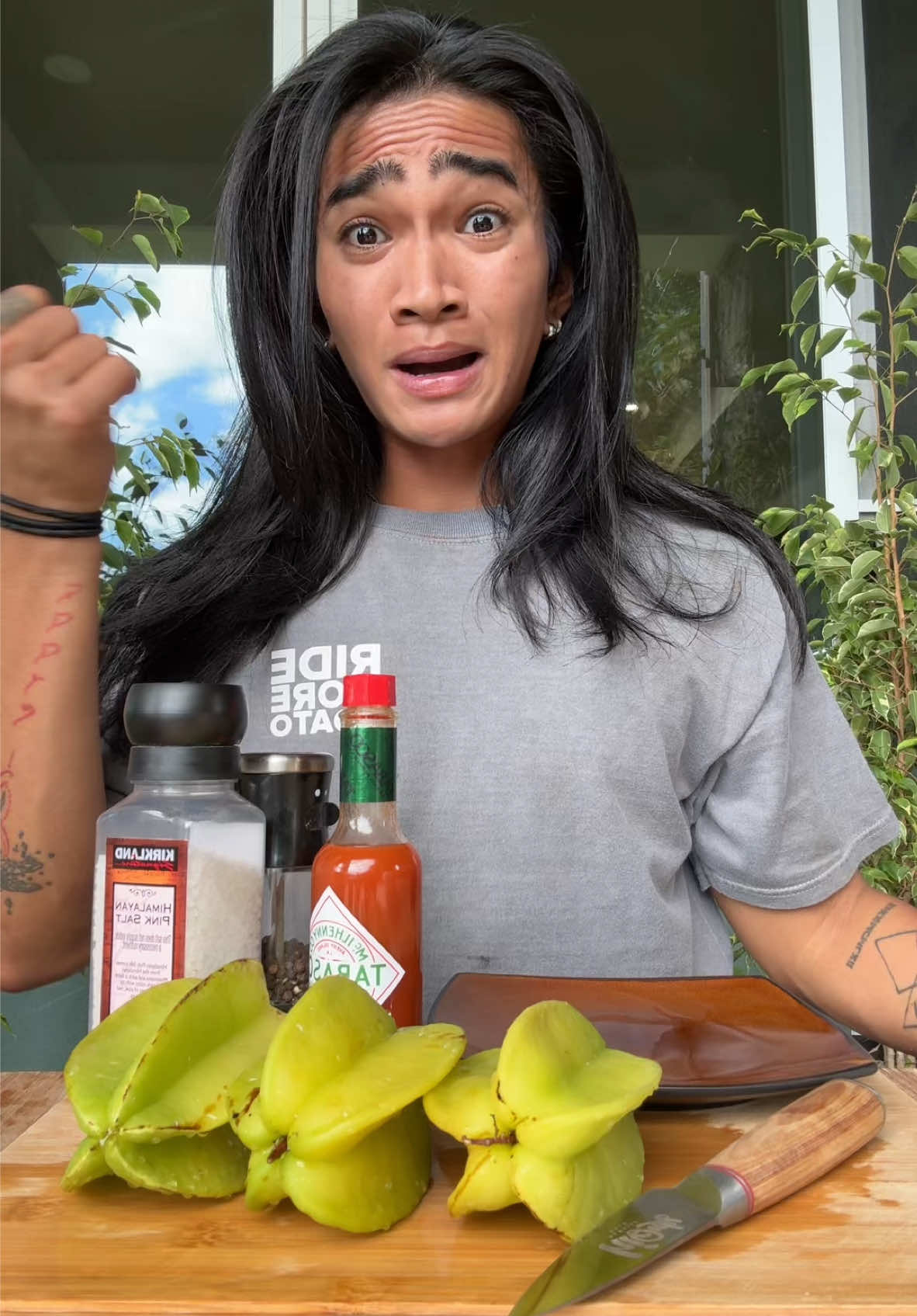 Trying my Star Fruit i grew !! ⭐️ also please dont mind my face im usually cuter than this i had so much sunscreen on and ive been gardening since 7 am 