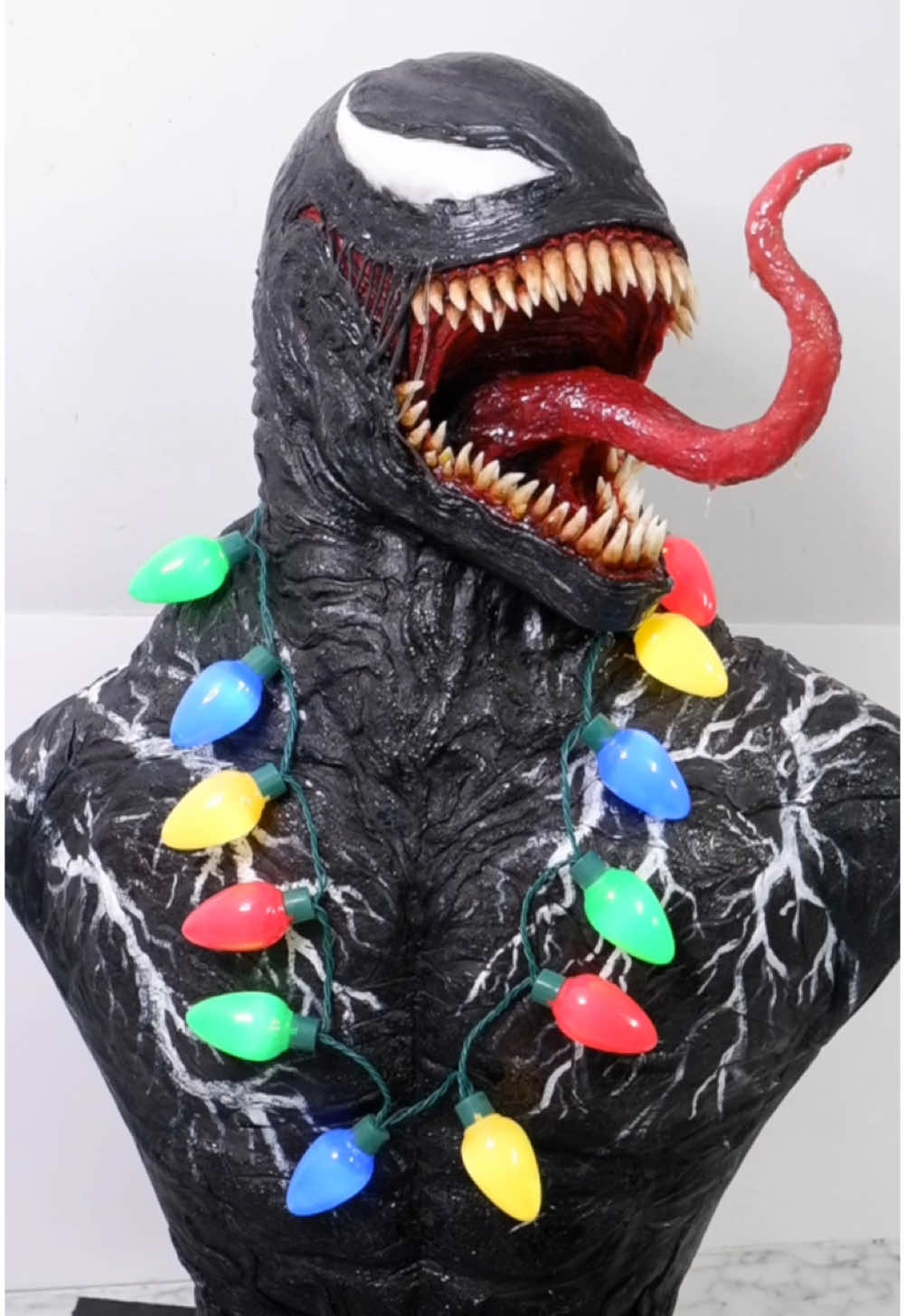 It's beginning to look a lot like Venom 🍰🎄 . Getting into the #Christmas spirit with this cake sculpture of my favorite symbiote. (with chocolate filling, of course 🍫😉) Watch #Venom: The Last Dance from your home - available to buy or rent now! #SonyPicsPartner @Venom: The Last Dance #cake #cakeart #sculpture