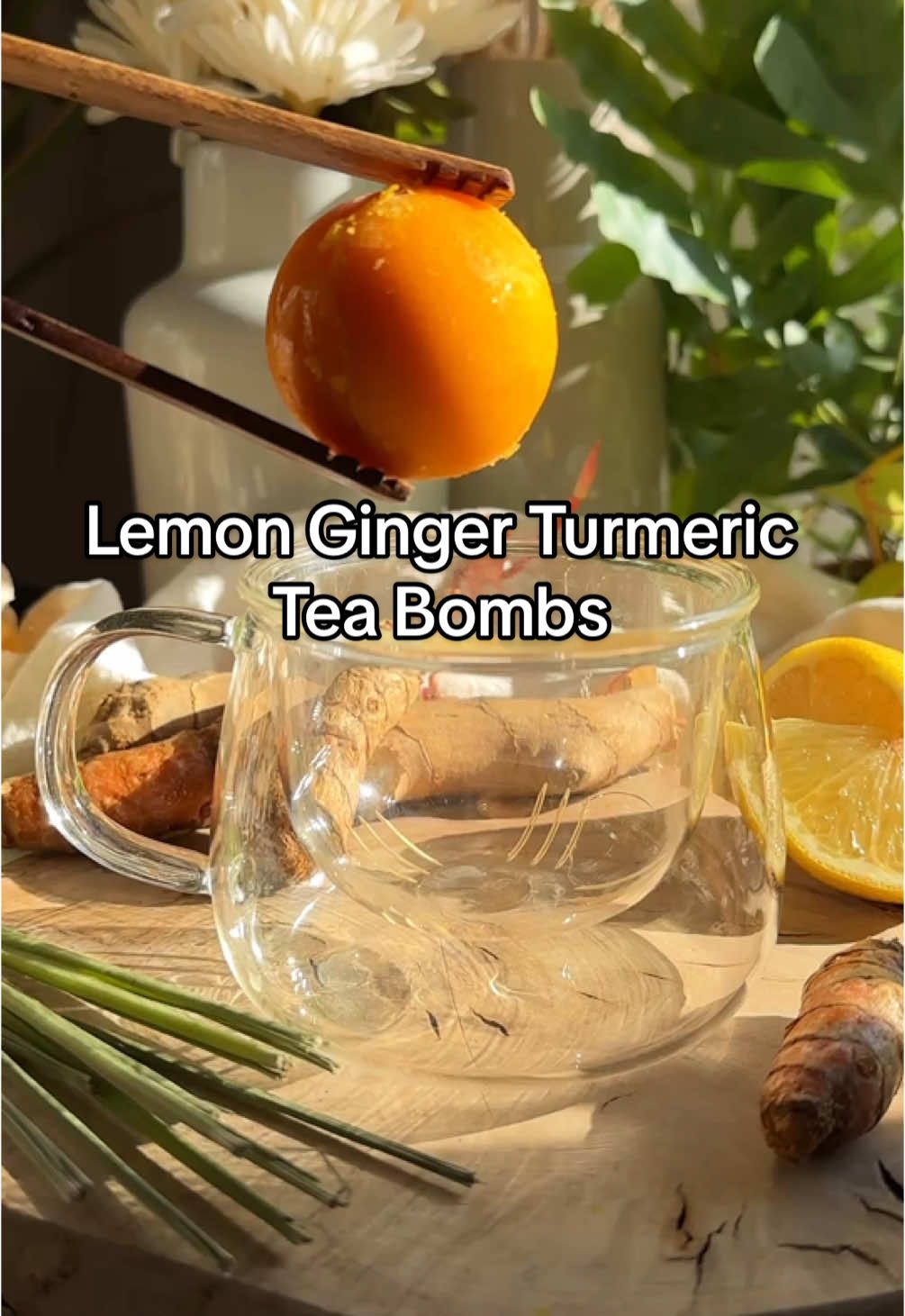 🍋Lemon Turmeric Bombs - Immune Boosting Series | ep 9 #lemongingertea #turmeric #tearecipe #coldandfluseason  ❤️‍🔥Should I keep the Immune-Boosting Series going?  Ingredients You’ll Need  ✨3-4 Lemons, cleaned and sliced into chunks ✨6 inches Fresh Ginger (55g about 2 ounces) ✨6 inches Fresh Turmeric (55g about 2 ounces) (or 1.5tbsp) ✨3 Stalks Lemon Grass (60g,  2 ounces) ✨1 ½ cups Water, plus more as needed to thin mixture (no more than ½ cup more) Blend the ingredients together. Carefully pour the mixture into ice molds (this recipe makes 10-12 two-inch frozen tea bombs). Place the filled molds in the freezer and freeze for at least 3 hours or overnight. When you’re ready to enjoy, add a frozen tea bomb to a mug. Pour in boiled water and stir. Strain if desired or enjoy as is! Sweeten with honey or agave as desired.