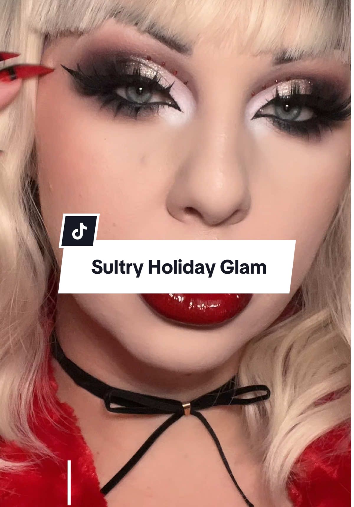 The glam is giving sultry santa baby and im obsessed. #makeup #makeuptutorial #eyeshadow #eyeshadowlook   @PLOUISE rumour base @Trixie Cosmetics snow bunny palette  @ColourPop Cosmetics frosty the @meltcosmetics onyx slick waterline pencil, supernatural mascasa @e.l.f. Cosmetics intense h20 proof eyeliner @madebymitchell @madebymitchellusa blursh book @DanessaMyricksBeauty yummy skin blurring balm powder @Estée Lauder doublewear foundation @Anastasia Beverly Hills magic touch concealer @Huda Beauty easy bake powder @NYX Professional Makeup buttermelt bronzer  @Rare Beauty enlighten highlighter @Milani Cosmetics make it last setting spray  @kissproducts lash couture matte velvet lashes @ONE SIZE BEAUTY on til’ dawn setting spray @Tatcha dewy skin cream