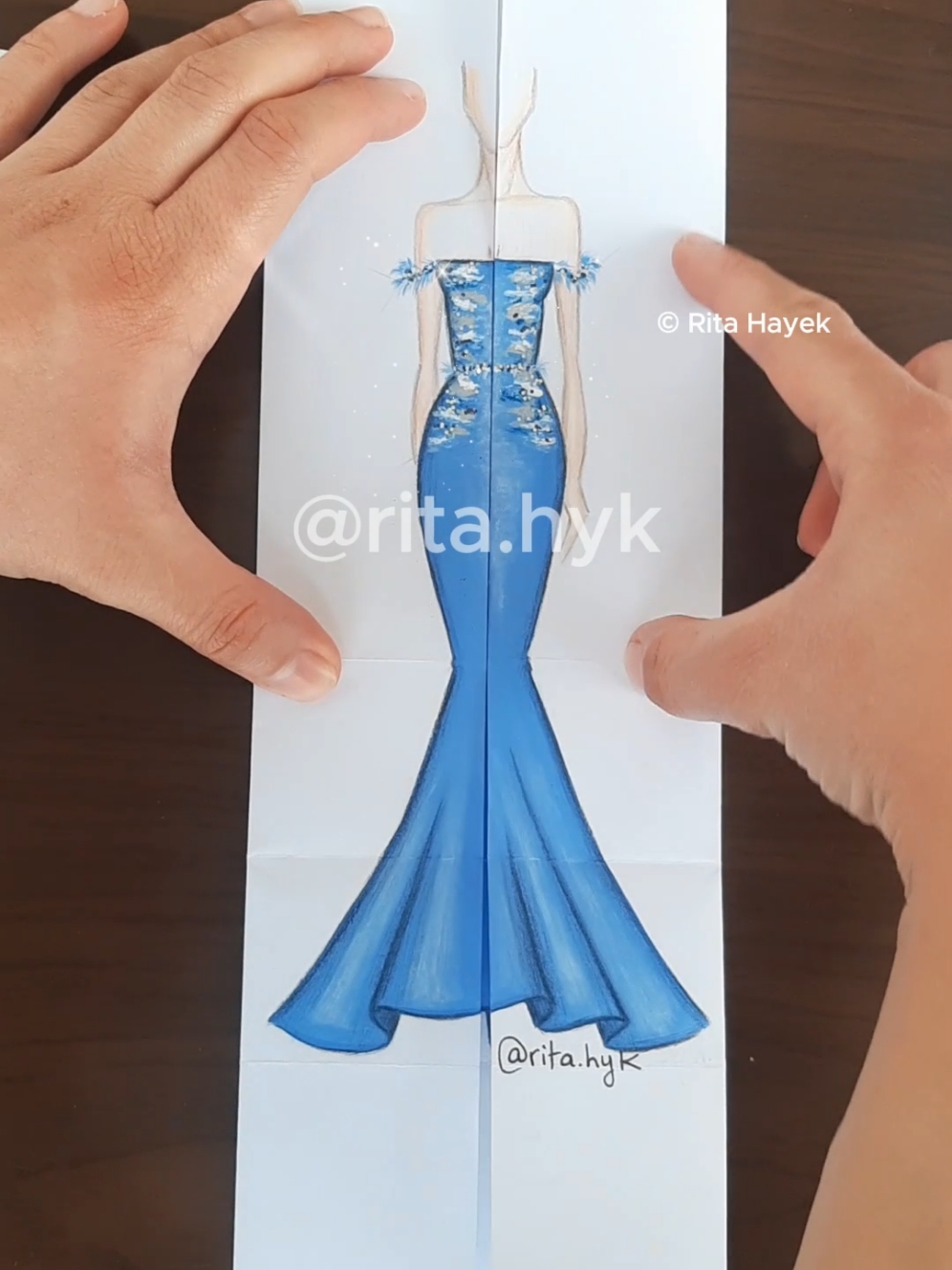 Sketches unfold with every fold💫 Interested in fashion drawing? Join my online lessons now! DM for more details❤ ©️ 2024 by Rita Hayek. All rights reserved. #fy #fyp #foryou #foryoupage #foryourpages #fashionillustration #fashionillustrator #fashiondesigner #fashiondesign #fashiontiktok #drawing #fashionsketch #art  #fashionart #papercraft #paperart #fashionsketching #paint #artist 