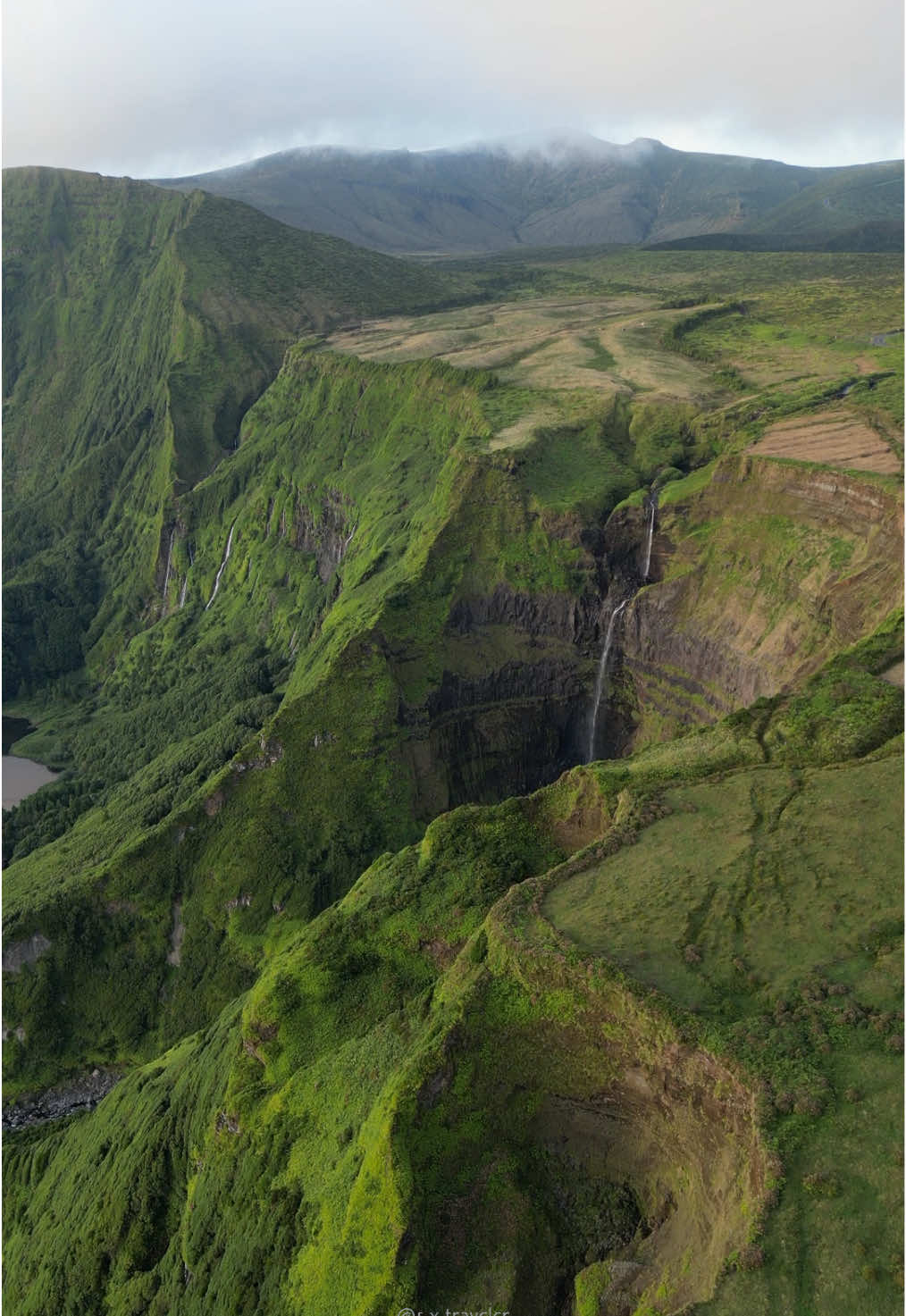 I know it looks like computer-generated imagery, but it’s not. 🌿 This is a real-life Jurassic Park 🦖 This enchanting island sits right in the middle of the Atlantic Ocean, between Europe and America 🌊  It belongs to Portugal 🇵🇹 and is called Flores 🌸 Part of the Azores archipelago, Flores is the westernmost point of political Europe. The island is a haven of primordial nature and unique flora. 🌺  It feels as if dinosaurs could still be roaming these ancient landscapes. 🦕 Agree? Follow @xtravel.azores for more inspiring content and travel tips 💫 Don’t miss the chance to witness this beauty for yourself! 💚✈️🌄 And explore even more stunning places with my INTERACTIVE GUIDE + MAP OF FLORES 🔗 Link in bio 👌🏼 #FloresIsland #Azores #Portugal #NatureWonders #TravelAdventure #ExploreNature #IslandParadise #AtlanticIsland #WildBeauty #Jurassic #HiddenGem #NaturalWonder #EcoTravel #ScenicViews #JurassicPark #DiscoverEurope #VisitAzores #JurassicWorld 