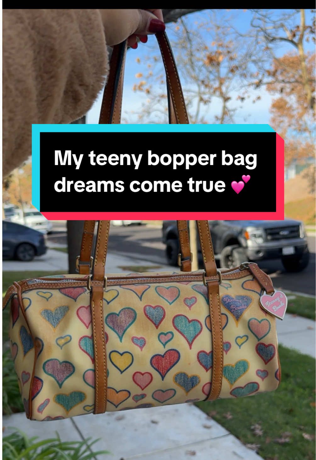 The way I was obsessed with this bag back in 2003 🩷🩵💜💚🧡 @Dooney and Bourke #dooneyandbourke #dooney #millenialsoftiktok #millenials #early2000s ##early2000snostalgia##lindseylohan##heartsbag##crayonhearts