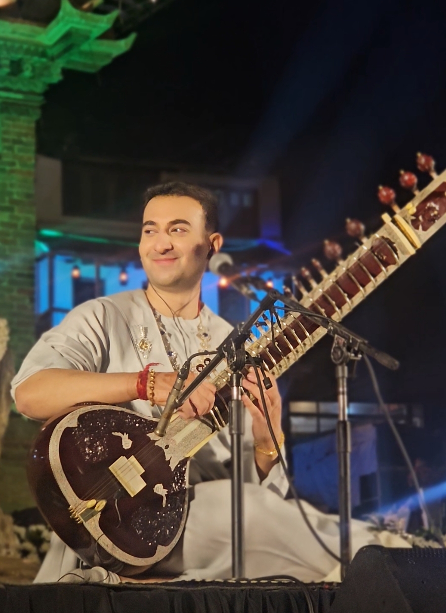 @Rishab Rikhiram Sharma playing at Patan Durbar Square  As the the youngest and final disciple of the legendary Pandit Ravi Shankar he is carrying forward the maestro's timeless legacy, redefining the sitar for a new generation. Tradition meets talent in its purest form.  #music #sitar 