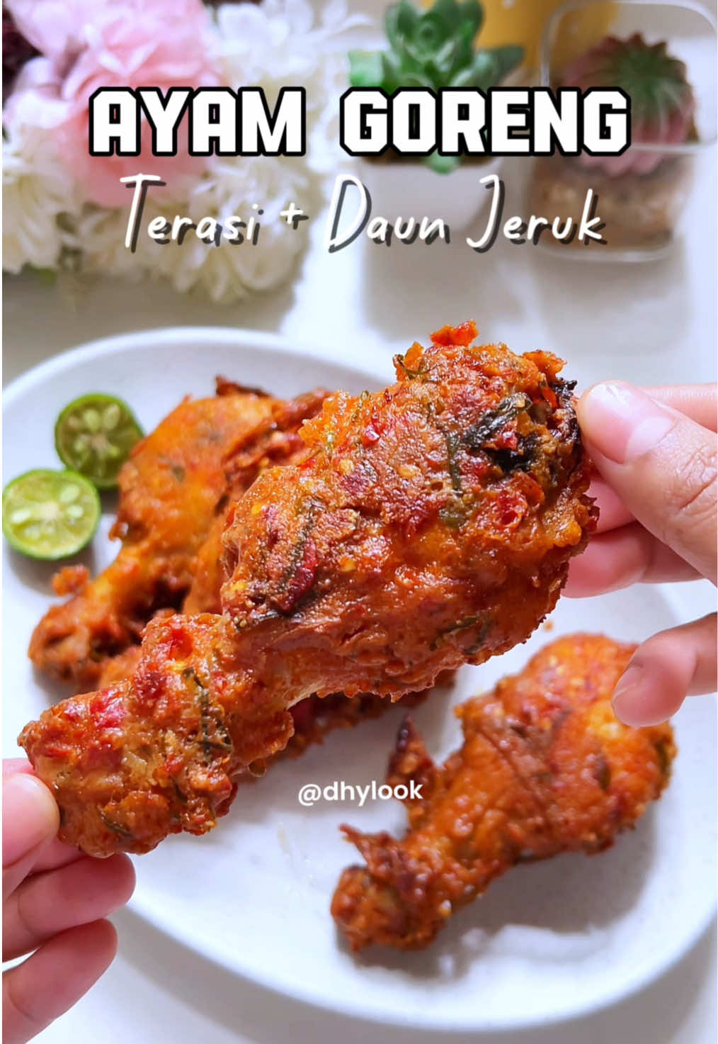 Ayam Goreng Terasi Daun Jeruk✨ Marinasi terbaik sejauh ini yang aku bilang YES! adalah resep kali ini, ayam yang di marinasi dengan terasi + daun jeruk. Aroma dan rasa rempahnya bikin si ayam makin nikmat banget.  Apalagi buat yang suka makan pedes kombinasi bawang putih dan cabe giling bener-bener bikin ngabisin stok nasi dirumah. Yuk #BelajarBikin Ayam Goreng Terasi Daun Jeruk! Resep:  - 600g Ayam (6 potong) bagian paha Bumbu Halus: - 7 Bawang Putih - 10 Cabe Merah - 1 Bulat Terasi  - 1 Butir Telur Bahan Lain: - 5 sdm Tepung Maizena - 1 sdm Tepung Terigu - 10 Daun Jeruk Iris (Tanpa Tulang) - 1 sdt Garam - 2 sdt Kaldu Ayam - 1/2 sdt Lada Hitam (Opsional) Note: - Goreng Api Kecil ke Medium : matang agak lama tapi bikin ayam matang sampai dalam - Goreng Double Frying: bikin luar bagian ayam lebih crispy - Marinasi wajib semalaman: bikin rasa bumbu terserap sampai kedalam daging #BelajarBikin #ayamgoreng #ayamgorengterasidaunjeruk #resepayamgoreng #resepdhy