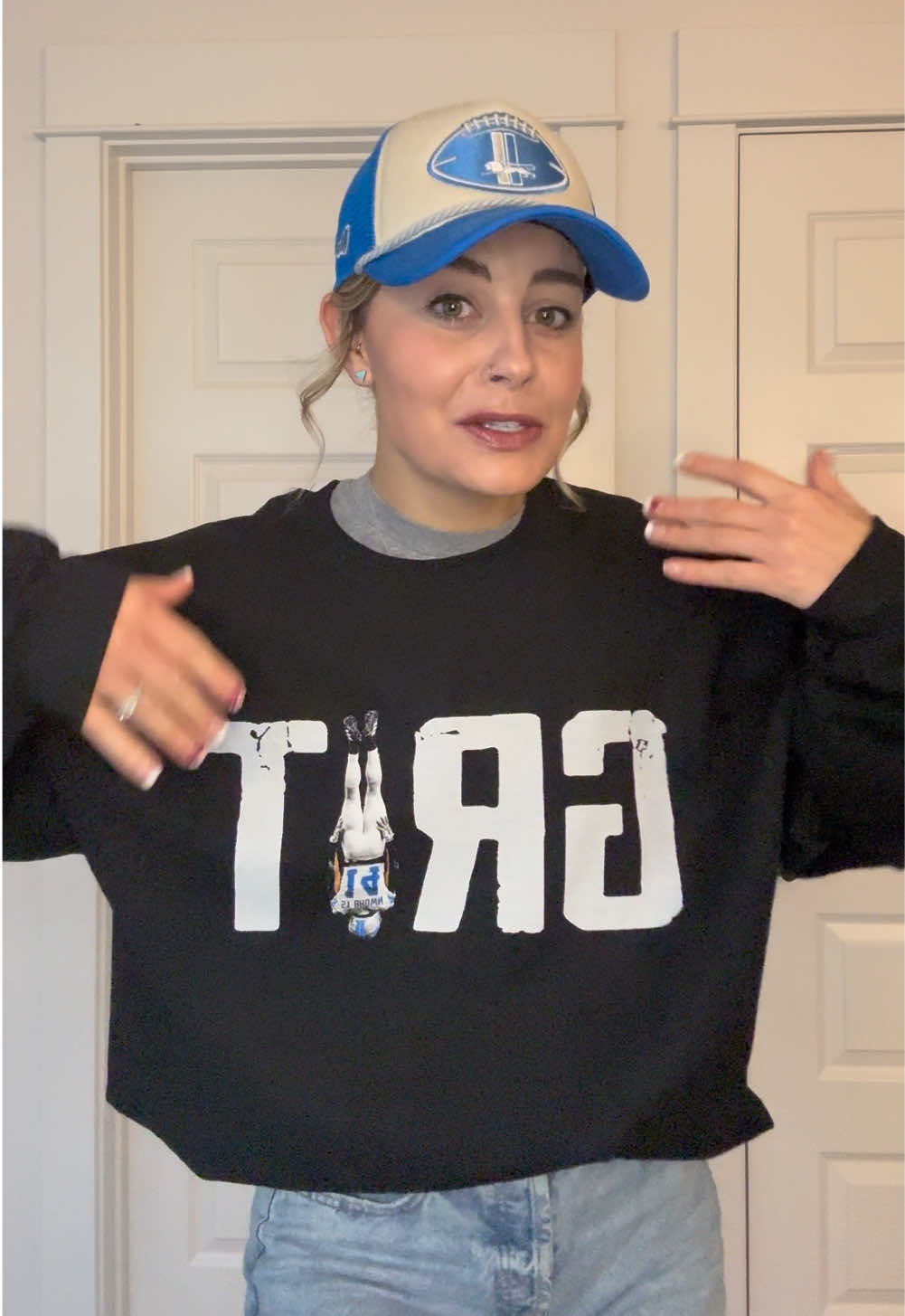 I grabbed this Detroit Lions GRIT Amon-Ra St. Brown sweatshirt, for my husband, for Christmas. And I had to try it on and show you guys. It’s the Gildan heavy blend sweatshirt, so it has that super soft fleece lining. The letters have that vintage look and of course it features Saint Brown doing his celebratory headstand after scoring the TD against the Packers. I got an extra large in the black. Detroit Lions stuff is selling out so fast, so go ahead and grab yours while you can. It’s only $22.50 with free shipping. And the shipping window is right around Christmas. ##detroit##detroitlions##detroitlionsfootball##amonrastbrown##stbrown##grit##detroitlionsfan##sundayfootball##nfl##nflfootball##grit##sweatshirt