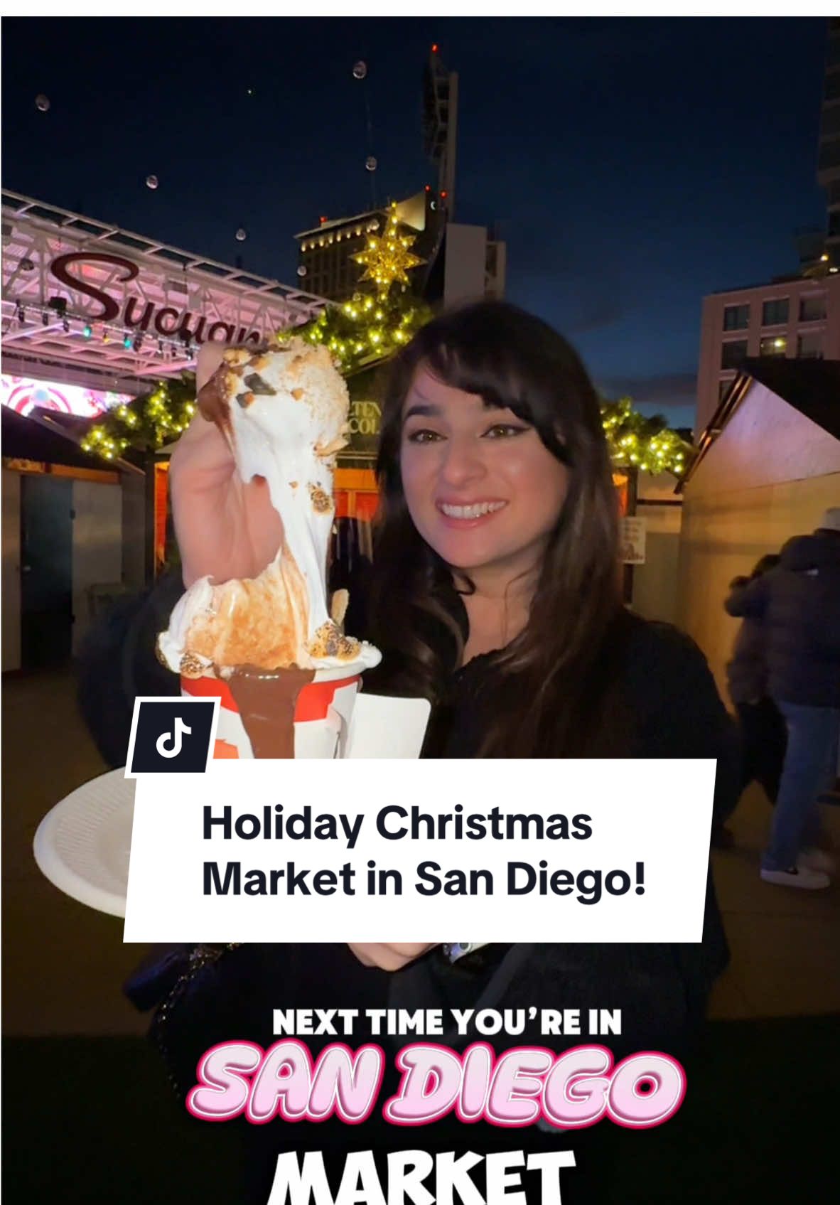 Holiday Market with the GRINCH in SD! 🎄  The Holiday Market is returning for its fourth year to the newly renovated Gallagher Square at Petco Park (@petcoparkevents   @petcopark ) until December 27 in San Diego! 🙌  They have so many holiday characters characters walking around for photo ops, snow to play in, visit live reindeer, live music, so many shopping huts to go shopping for the perfect stocking stuffers and hand crafted holiday gifts. Don’t forget to walk through the wintery light displays with nightly snow fall to get a european chipping chocolate topped with smores to share & go up stairs to soak in the beautifully decorated 40-foot Christmas Tree! P.S. Sip on some spiked cider or mulled wine too! 🎅  ENTRY: Enter though the Balboa Gate, located on Ninth Ave. and J St. during your designated entry hour located on your ticket. Once inside, guests may stay for as long as they like. No re-entry is permitted. Buy your tickets on their website! 📱  Alright, now that you know this spot exists, tag a friend and say lets go! #firstdateguide #seasonal #holiday #christmas #sandiego #thingstodo #activity #foodreview #christmasdecorations #reindeer #gifts #wheretogo #xmas #foodvideo #smores