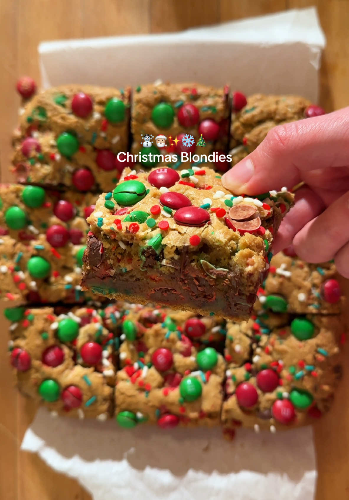 Replying to @POKETV Christmas blondies💚❤️💚❤️ instructions below and in the video😄 #baking #christmas #fyp #foryou @KerrygoldUSA @M&M'S US Recipe is from @insidebrucrewlife Ingredients: • ½ cup unsalted butter, softened • 2 cups packed light brown sugar • 2 large eggs • 2 teaspoons vanilla extract • 1 teaspoon salt • 2 teaspoons baking powder • 2 cups all purpose flour • 1 cup holiday M&M's + extra • 1 cup chocolate chips • ¼ cup holiday jimmies + extra Instructions: 1. Preheat the oven to 350° F. Spray a 9x13 glass baking pan with nonstick baking spray. **(I didnt have a 9x13 glass dish available so i used a 8x8 and baked it for 35-40 minutes)** 2. Beat the butter and brown sugar with an electric mixer until creamy. This will take 3-4 minutes. Add the eggs and vanilla and beat again. 3. Stir together the salt, baking powder, and flour and slowly mix it into the butter mixture. The mixture will be thick like cookie dough. 4. Stir 1 cup M&M's, chocolate chips, and ¼ cup sprinkles gently into the batter. 5. Spread the batter in the prepared pan. Sprinkle the top with the extra candies and sprinkles. 6. Bake for 22-25 minutes (or 35-40 minutes if baking in 8x8 pan). Let the cookie bars cool completely before cutting into squares.