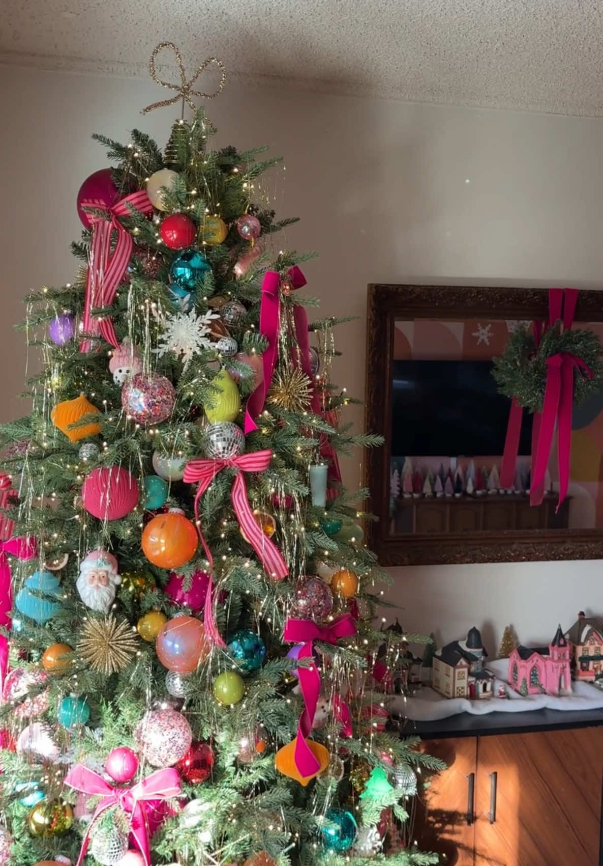 When the sun hits the christmas tree just right and the disco balls sparkle, my heart skips a beat ✨ #christmasdecorating #christmastreedecorating #christmastree #christmastiktok #christmasdecor #christmastreedecor #mycolorfulhome #colorfulhome #maximalistinteriors #maximaliststyle #midcenturymodernhome #maximalistdecor #livingroomdecor #discoball 