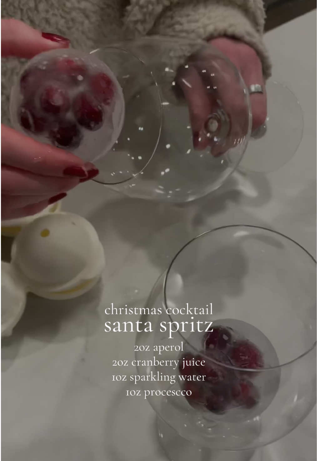 such a yummy twist on your typical aperol spritz during the holidays! #holidays #aperolspritz #spritz #holidaydrinks #christmas #cranberry #bubbly #christmascocktails #cocktails #foryou #fyp