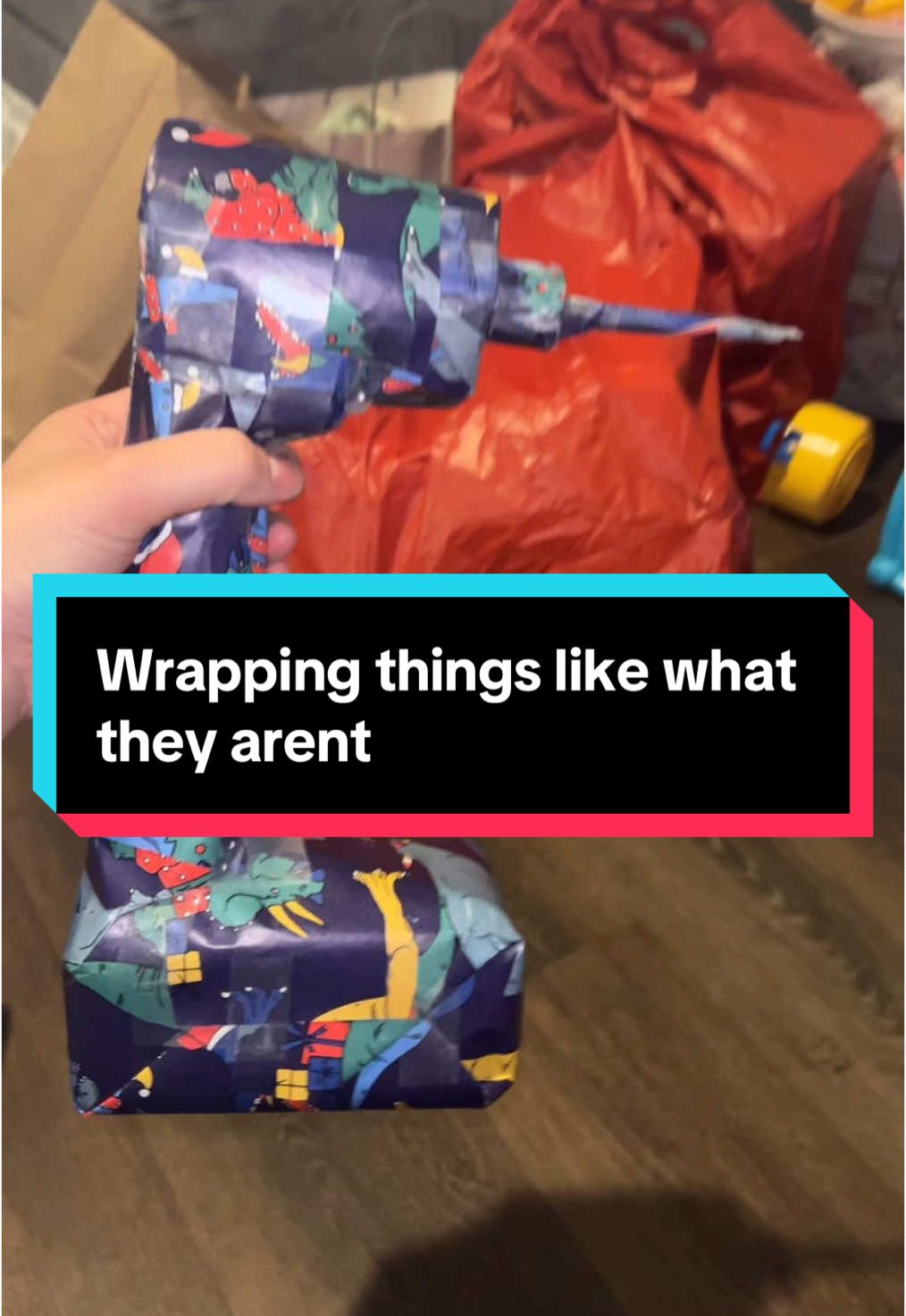 MORE SUGGESTIONS OF FUNNY SHAPES TO WRAP THINGS PLEASE AND THANKS!! #funnygift #christmaswrapping #christmastime #christmas2024 #giftidea #whiteelephant #follow #roadto5k 