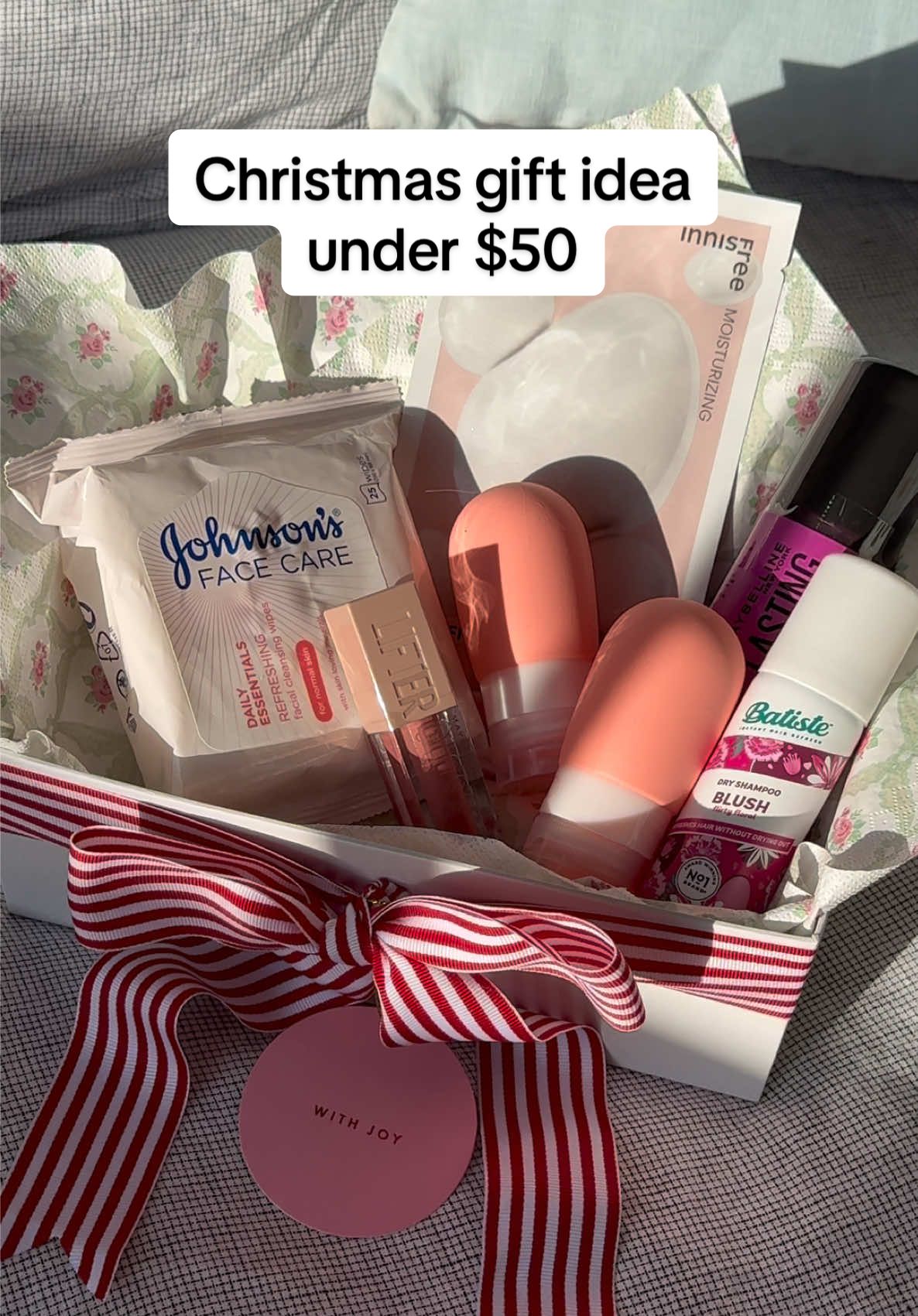 When you can grab everything you need for a thoughtful and practical gift in one place 🙌🏻 One trip to @Priceline Australia = super thoughful gift under $50! Perfect for summer travels or a girls’ trip. Thoughtful gifting doesn’t have to be complicated - this one was simple, useful, and so fun to put together!  Here’s what I included to recreate this gift: 	•	K-beauty hydrating sheet mask 	•	Travel-sized bottles for skincare 	•	Travel-sized dry shampoo 	•	Facial cleansing wipes 	•	Maybelline Lasting Fix setting spray 	•	Maybelline Lifter Gloss AD #gifttok #gifting #gifts #giftsforher #beauty #skincare #friendmas #christmasgift #giftguide 