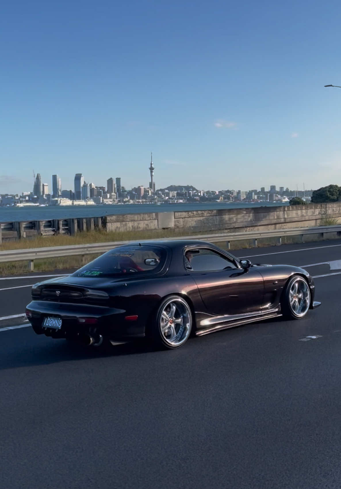 Haters will say this isnt the best view on earth. 😏 #view #city #auckland #newzealand #cars #carsoftiktok #jdm #rx7 #foryou #fyp 