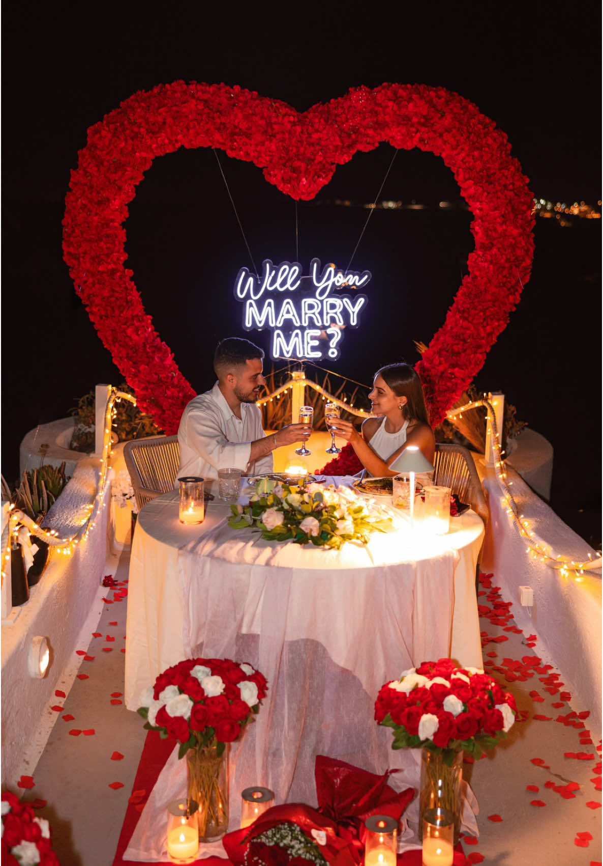 Tis the season of love, and this moment was the most magical of all ✨💍 : @AthermiSuitesSantorini  : We can't wait to make your proposal dreams come true✨ : #santoriniphotographer #santoriniproposal #santoriniweddingplanner #santoriniproposals #decor #proposal #santoriniproposals #santoriniproposalplanner #santoriniproposalpackages #frankoproposalplanner O #santorini #heartofflowers #roses #luxarypropopol #marryme #santorinimarryme #shesaidyes #rings #she_saidyes