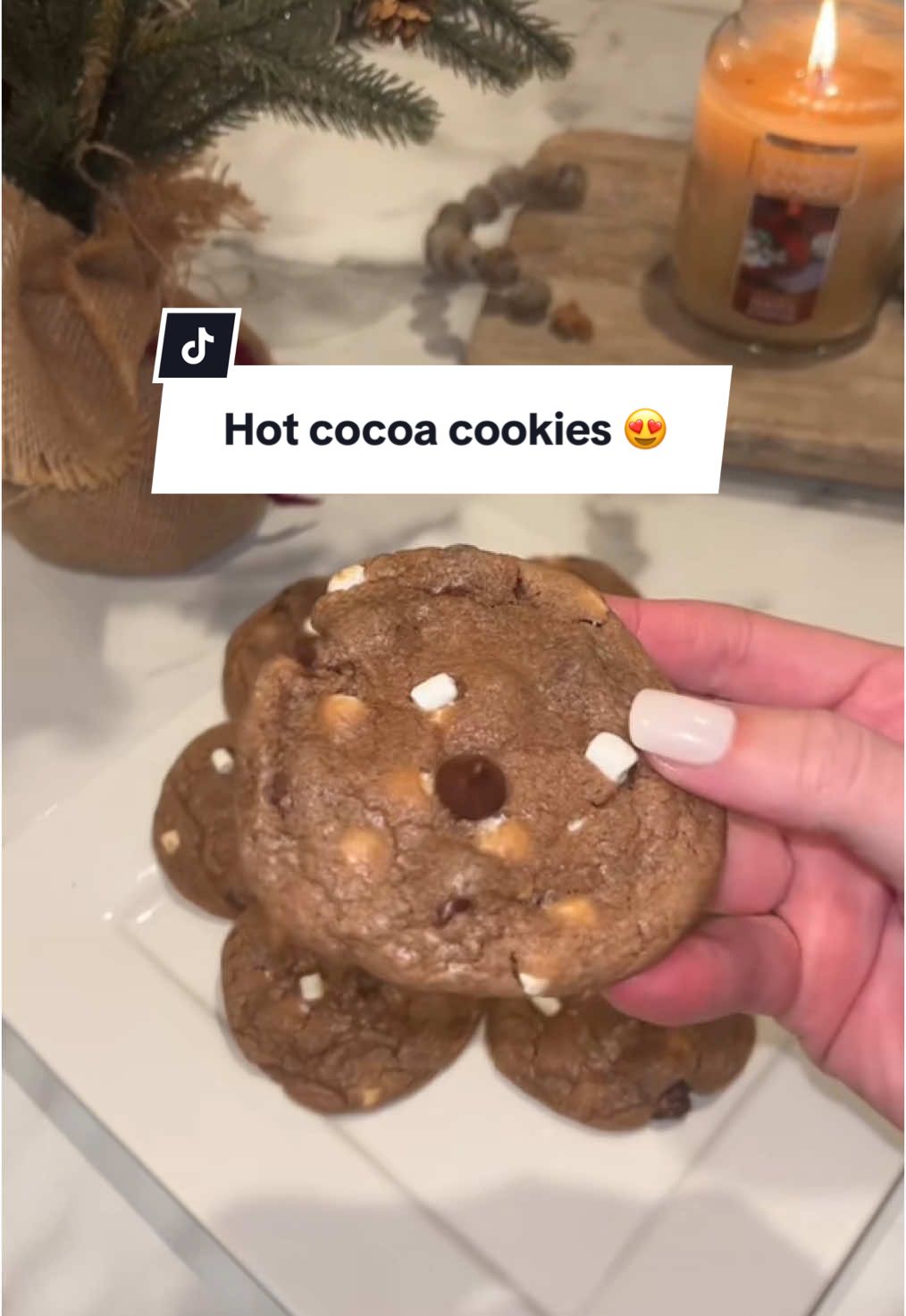 So yummy! 😍  Combine: -1 cup softened butter -1 cup sugar -2/3 cup brown sugar -2 eggs -1 tsp vanilla extract In a separate bowl: -3 1/4 cup flour -4 packages of hot cocoa mix -1 tsp salt -1 tsp baking soda -2 tsp baking powder Instructions: -Add dry ingredients to wet ingredients -Fold in 1 cup of chocolate chips. -Refrigerate for at least 30 minutes. -Then add 1 cup of Mallow bits. Bake at 350 degrees for 9-11 minutes. #cookie #christmascookies #christmasbaking #christmasbakingideas