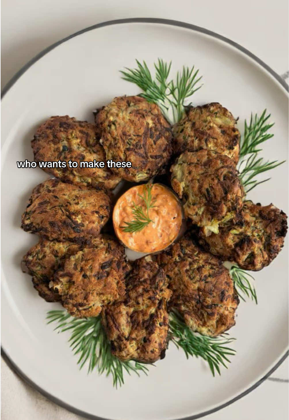 I have seen a few non vegan versions these all over the Internet, and recently I made a vegan version, and boy was I happy I did. They are delicious.  I originally made these with store bought vegan ricotta, but today I made them this time with my homemade cashew ricotta and they tasted even better. 🌱🌱zucchini ricotta fritters🌱🌱 Ingredients: 2 large green zucchini 1 tbsp salt 8 oz vegan cashew ricotta (homemade) or store bought  1/2 cup shredded vegan parm  Fresh dill, chopped 1 cup bread crumbs Oil Method: Grate zucchini and put in a colander over a bowl.  Add salt and let it sit for about 10 minutes. Add the ricotta and cheese to a bowl and mix together.Add the zucchini To a clean dish towel  and squeeze out as much of the liquid as you can. Add the zucchini to the cheese mixture and combine.  Add the dill and breadcrumbs. At this point use your hands to mix it all together. Scoop out a large spoonful of the mixture and form the fritters.  Brush both sides of the fritters with a little oil . Air fry at 400F for 10-15 minutes until golden.  Serve with some vegan Greek yogurt , crushed Calabrian peppers, splash of sriracha and dill. 	 	   #eatmoreplants #veganrecipes #veganlunch #fritters #eatplants🌱 #spicyfood #airfryerrecipes #plantbased #zucchini #foodvideo #vegancheese #veganfoodshare #glutenfree #asmrsounds #recipevideo #veganbowl #crunchyasmr #whatsinmybowl #foodvideos #recipeoftheday #eatstagram #veganbowls #crispyfood #whatveganseat #EasyRecipes #holidayfood   #easymeals #appetizer #foodfyp #viralfood #viralrecipe  Do prefer recipes with “made from scratch ingredients “ or store bought