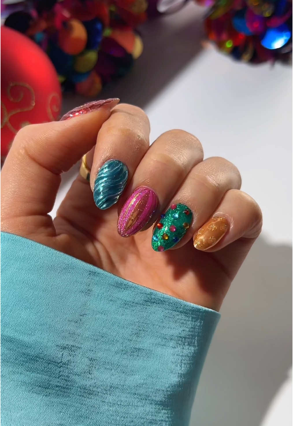 a non-traditional, colourful christmas bauble design 🌈🎄🌟❄️✨  product details:  • liner brush & buffing file from @wanderGEL official - code NAILOLOGIST10 for 10% off • the rest of the products are linked on my @Amazon sf  • rings from @Luv Aj  #nails #nailspo #nailinspo #nailart #christmasnails #nailarttutorial #nailtutorial 